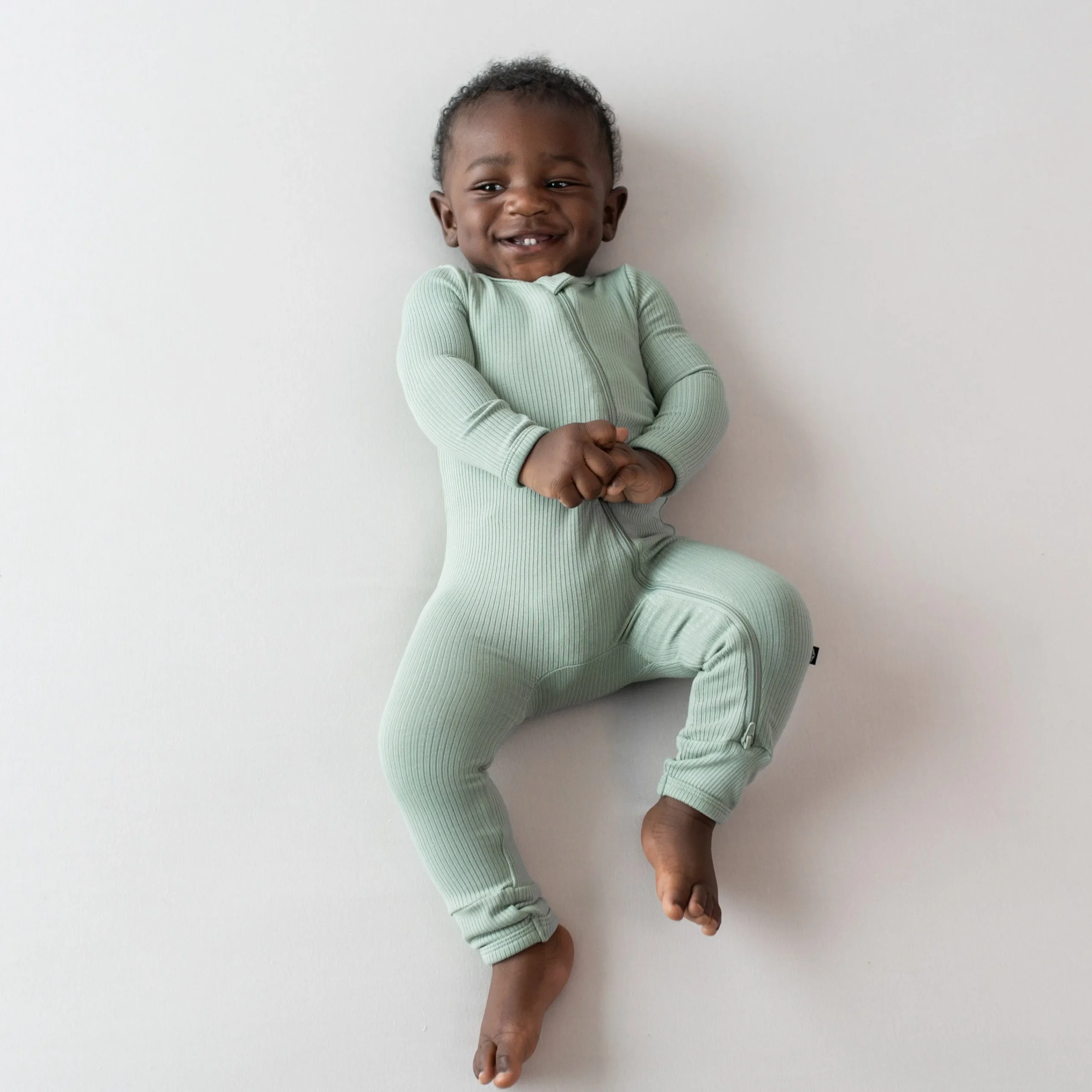 Kyte Baby Ribbed Zipper Romper in Thyme Sale