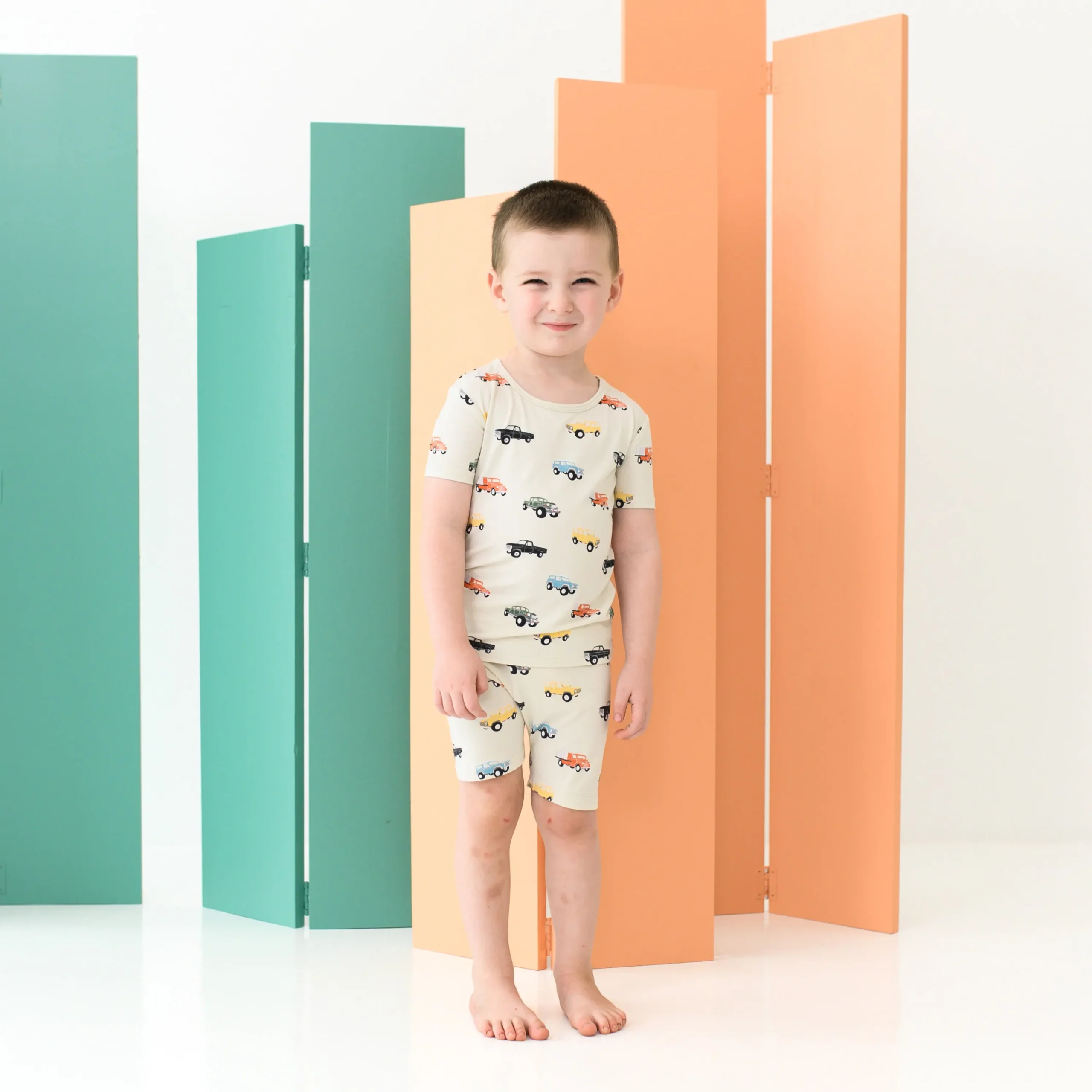 Kyte Baby Short Sleeve Pajamas in Vintage Truck Hot
