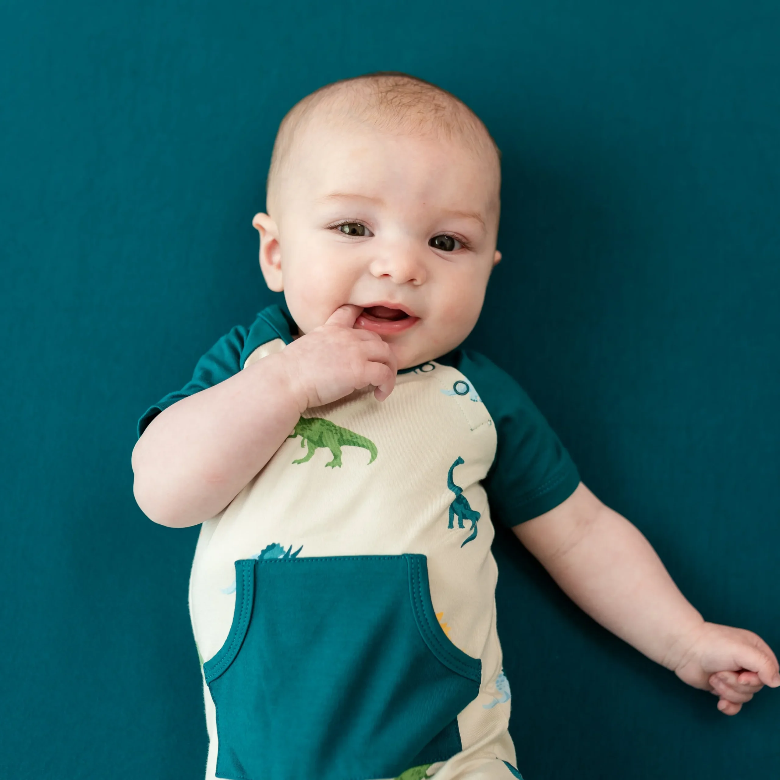 Kyte Baby Shortall in Ecru Roar Hot