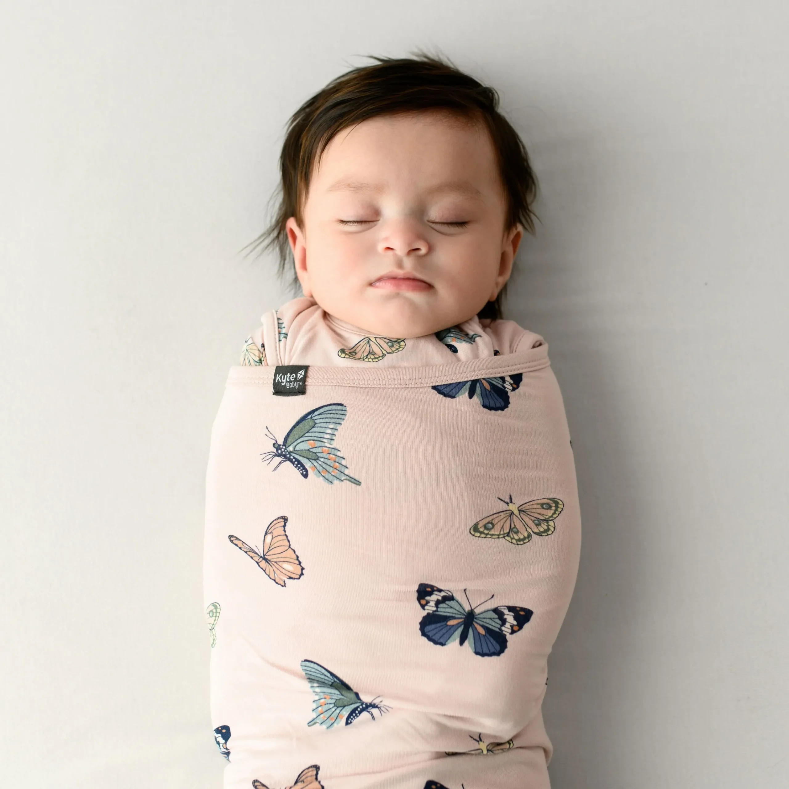Kyte Baby Sleep Bag Swaddler in Blush Butterfly 0.5 Clearance