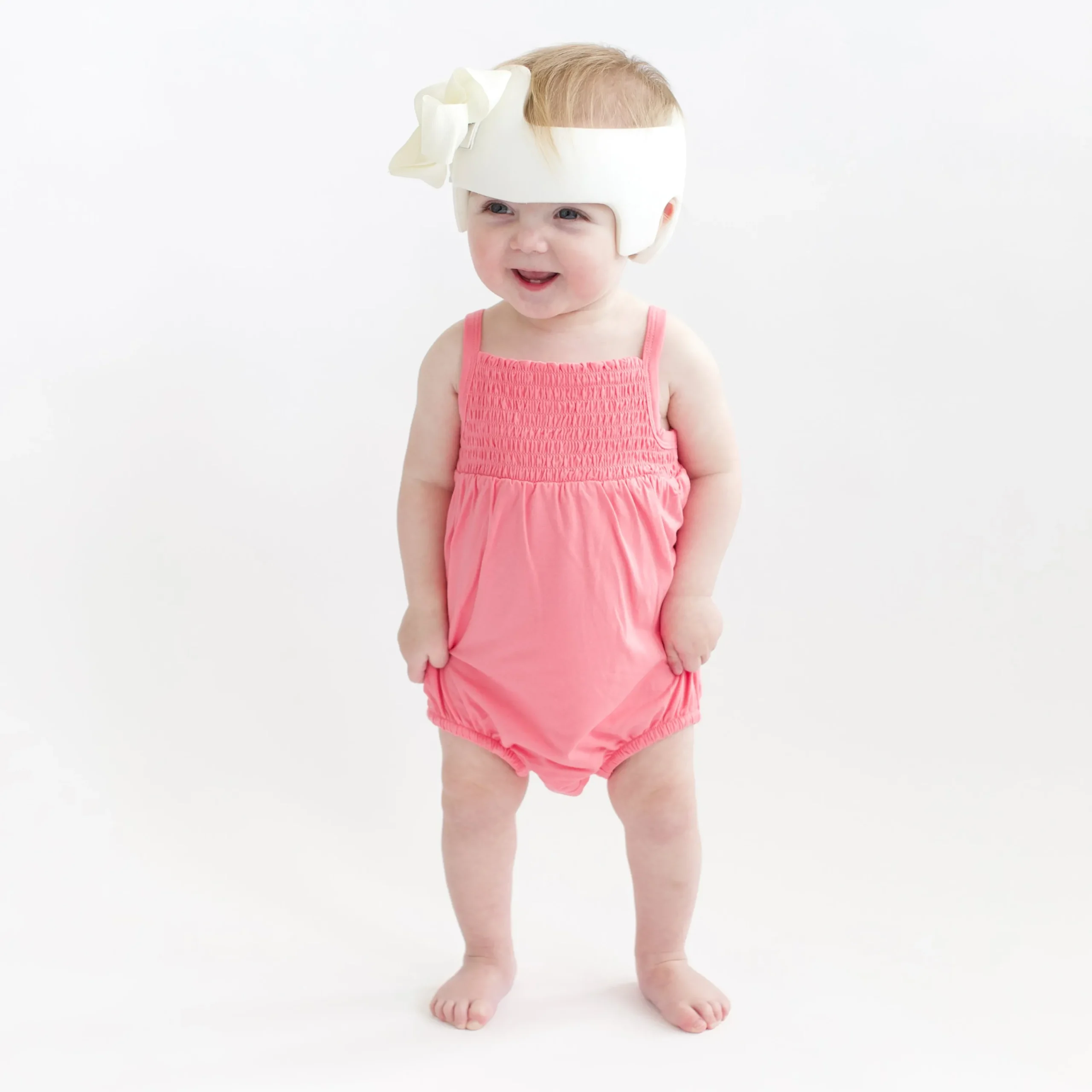 Kyte Baby Smocked Bubble Romper in Guava Discount
