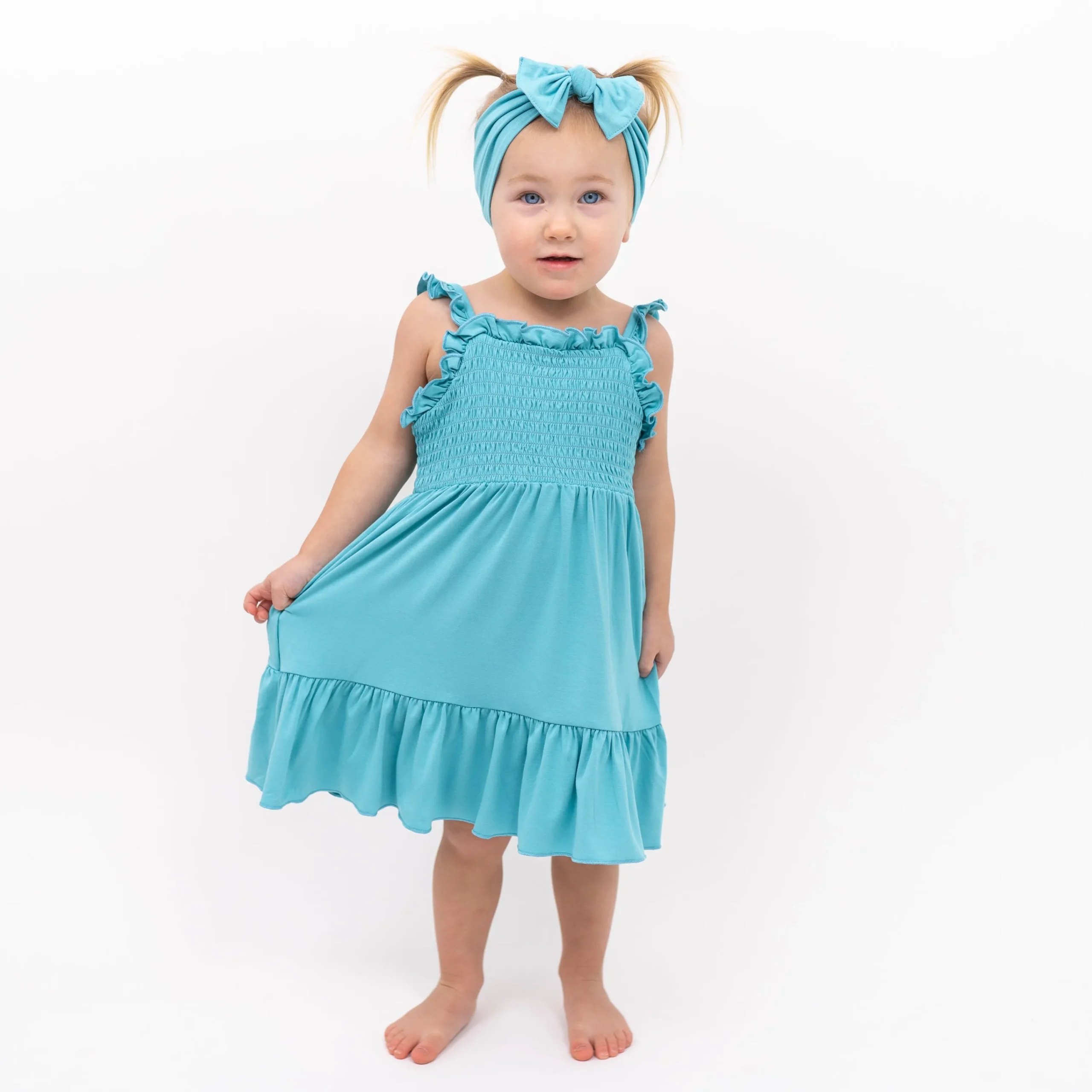 Kyte Baby Smocked Dress in Makai
