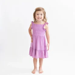 Kyte Baby Smocked Dress in Poi Best