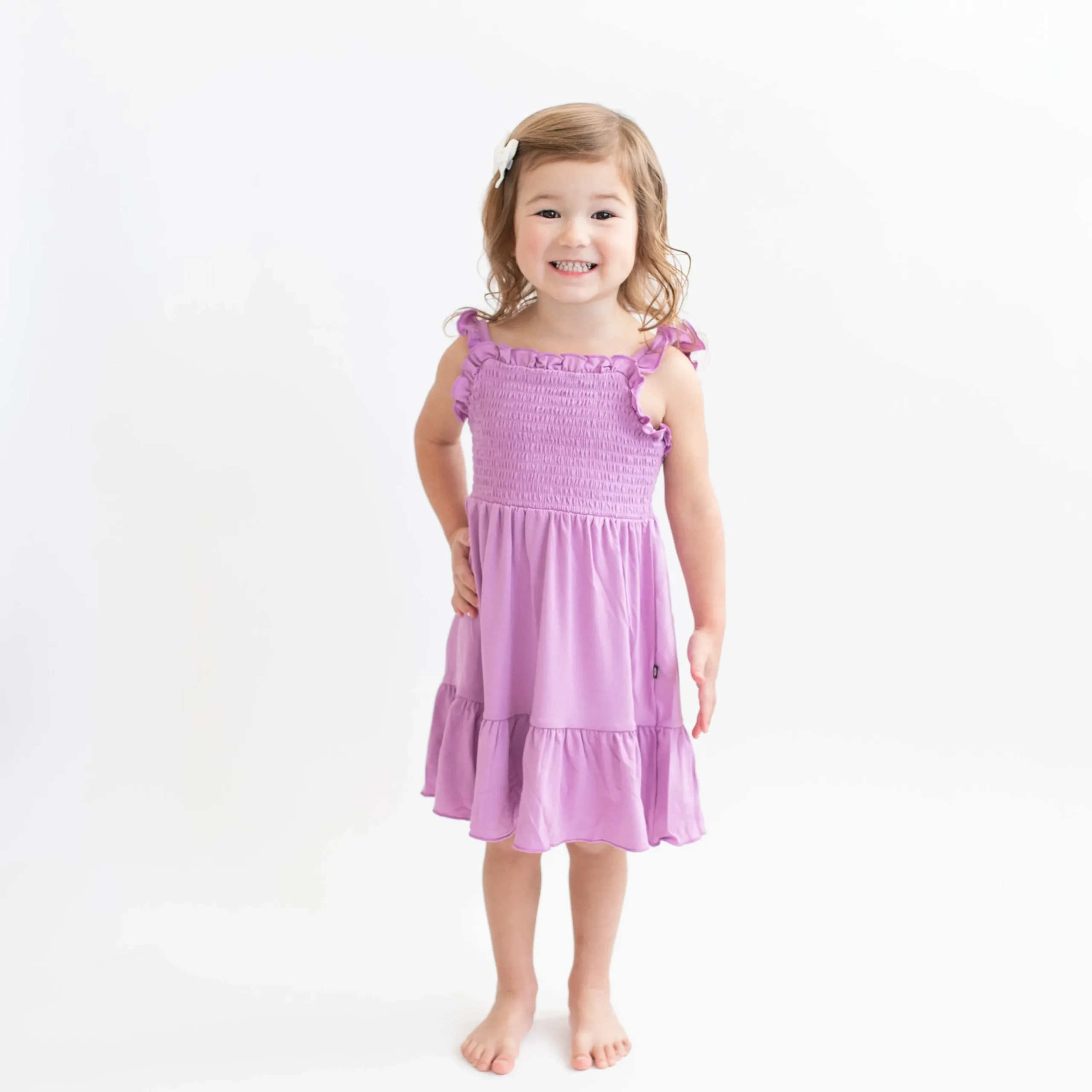 Kyte Baby Smocked Dress in Poi Best