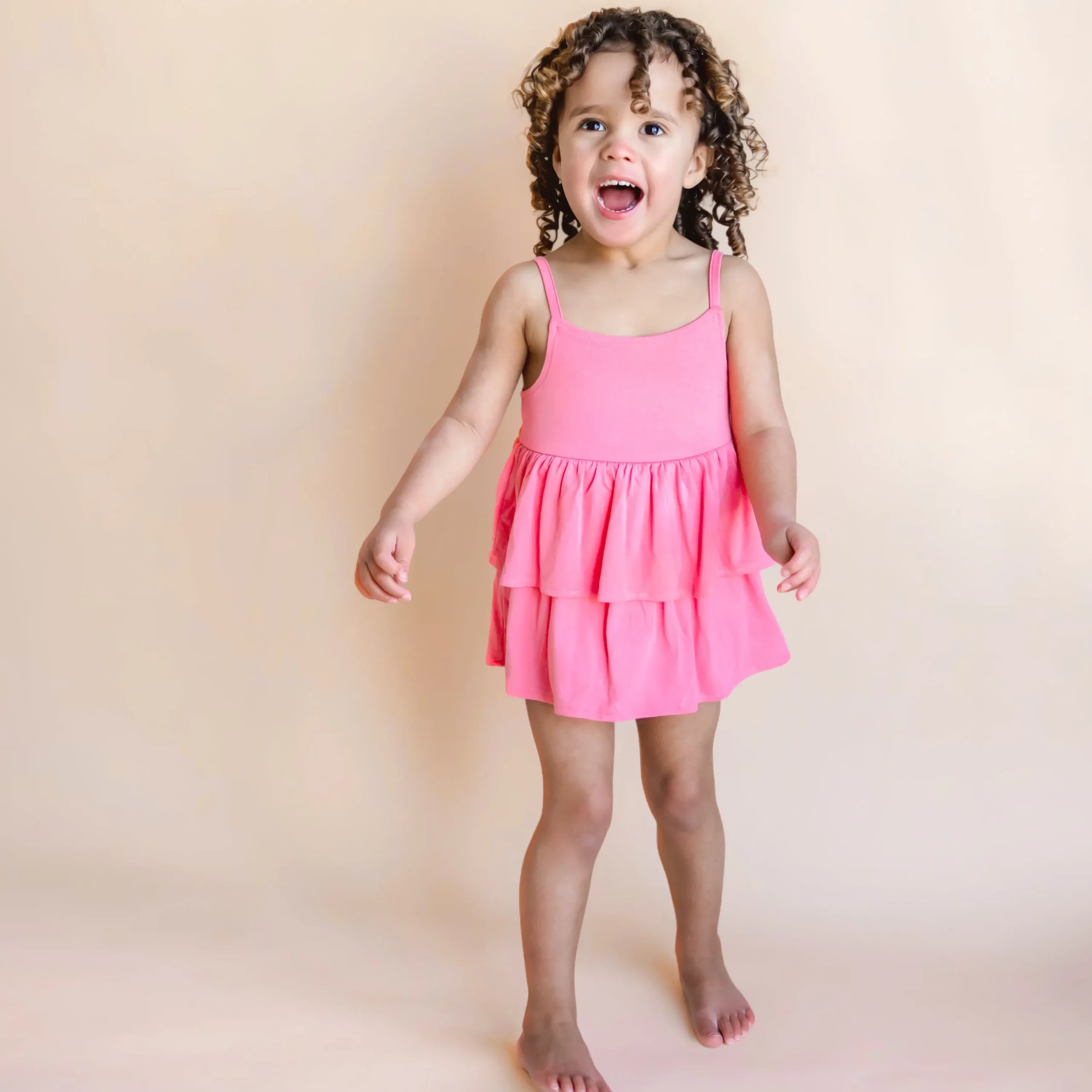 Kyte Baby Spaghetti Strap Ruffle Romper in Guava