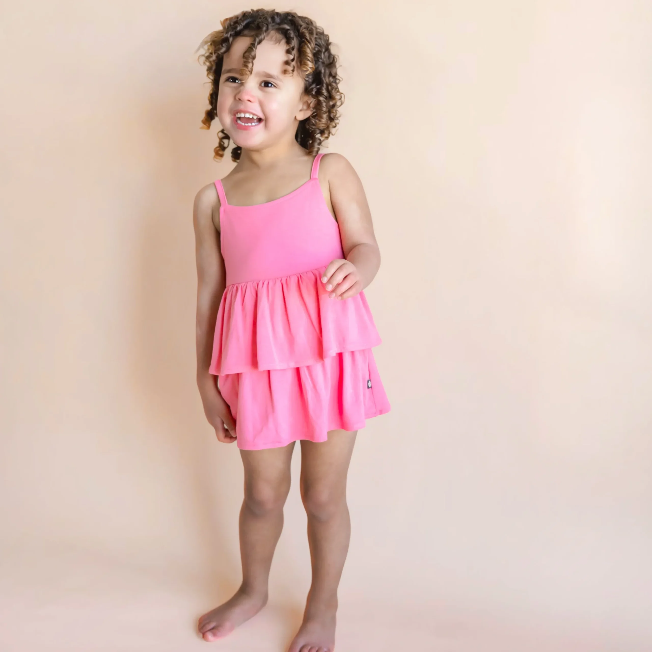 Kyte Baby Spaghetti Strap Ruffle Romper in Guava