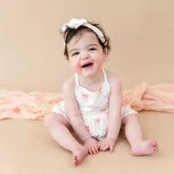 Kyte Baby Spaghetti Strap Ruffle Romper in Bow Online
