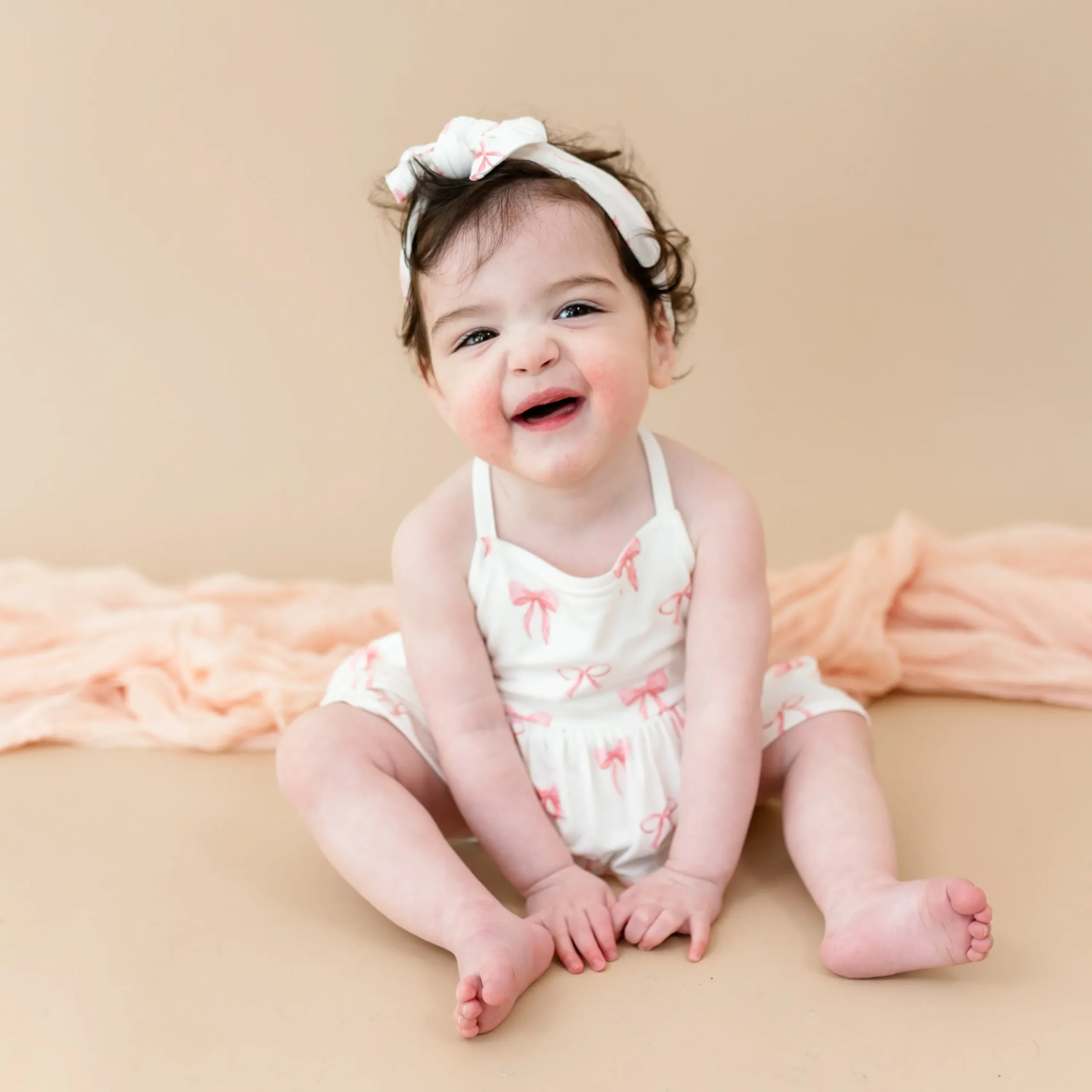 Kyte Baby Spaghetti Strap Ruffle Romper in Bow Online