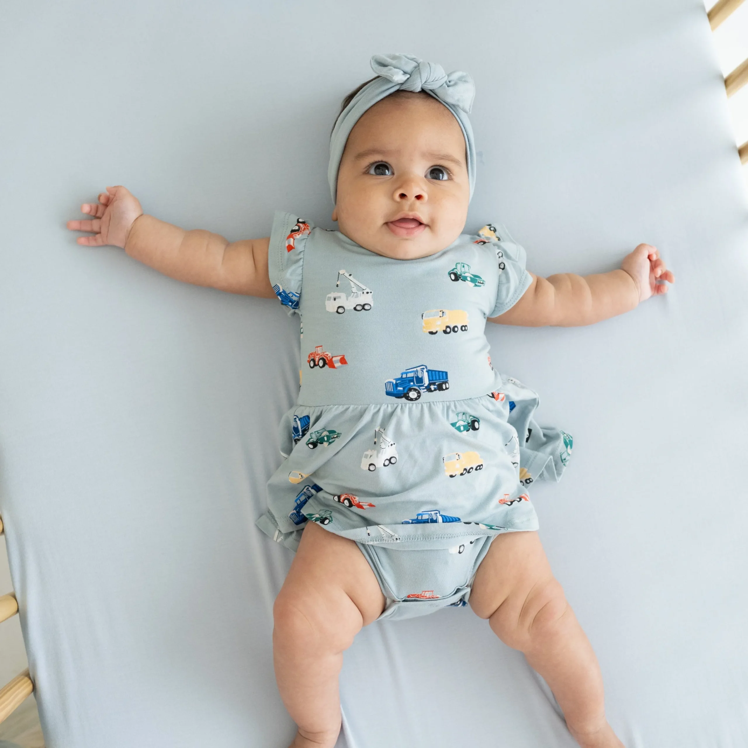Kyte Baby Twirl Bodysuit Dress in Construction Clearance