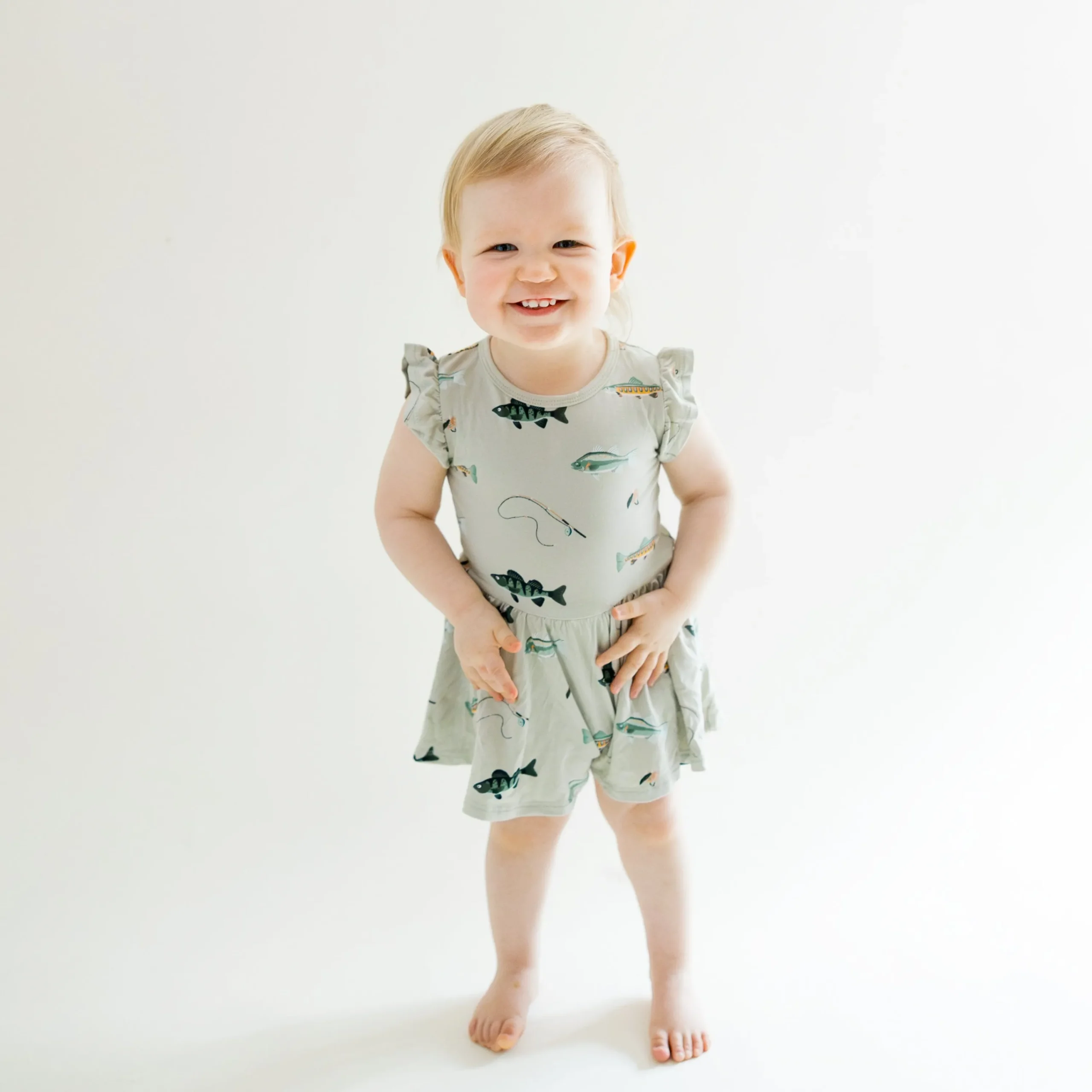 Kyte Baby Twirl Bodysuit Dress in Fishing Hot