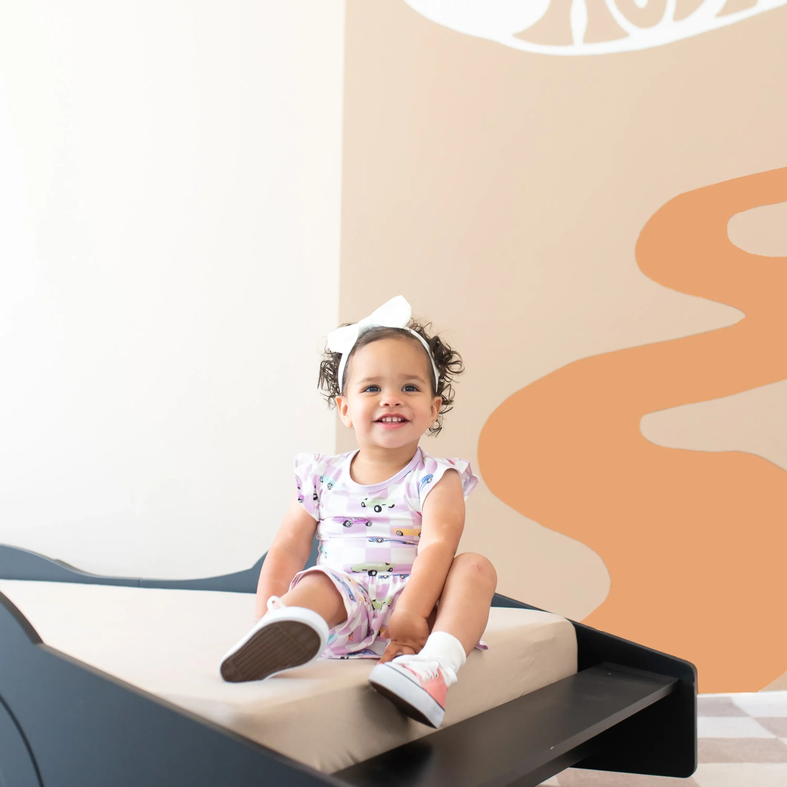 Kyte Baby Twirl Bodysuit Dress in Sparkles and Speed Best