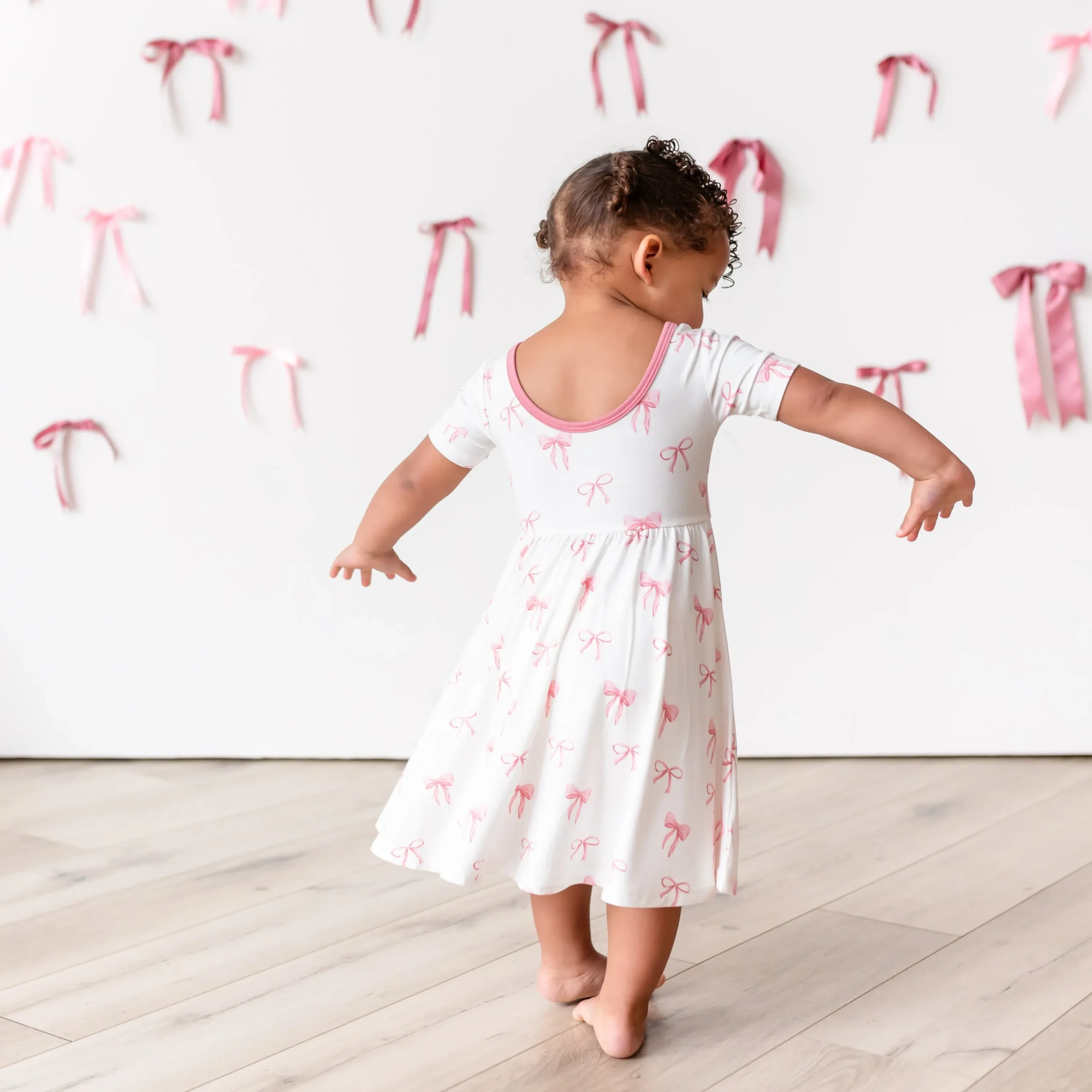 Kyte Baby Twirl Dress in Bow Sale