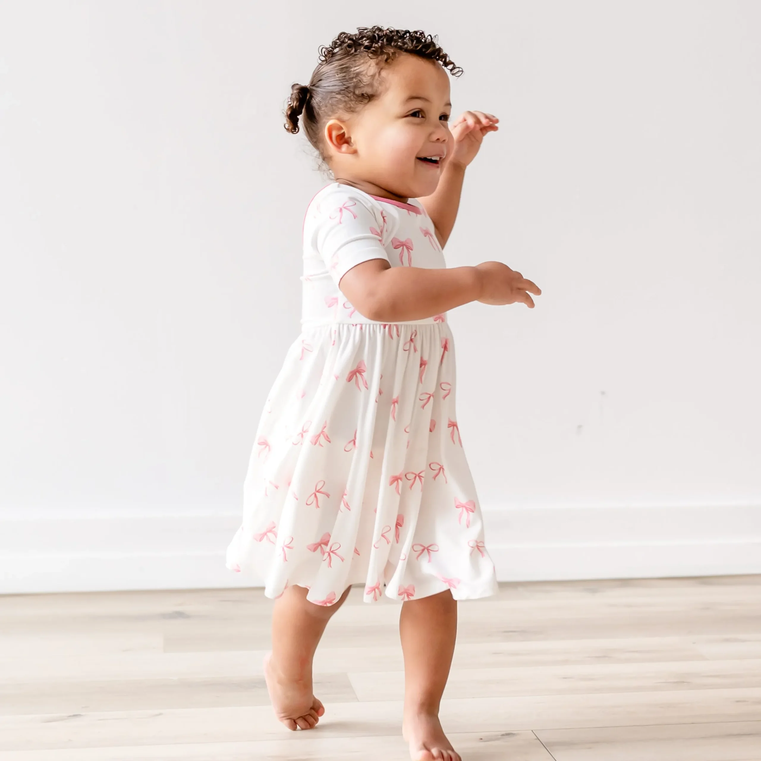 Kyte Baby Twirl Dress in Bow Sale