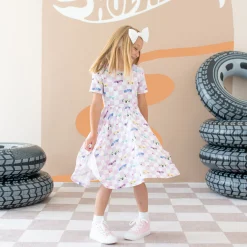 Kyte Baby Twirl Dress in Sparkles and Speed Hot