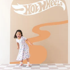 Kyte Baby Twirl Dress in Sparkles and Speed Hot