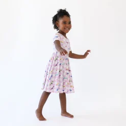 Kyte Baby Twirl Dress in Sparkles and Speed Hot