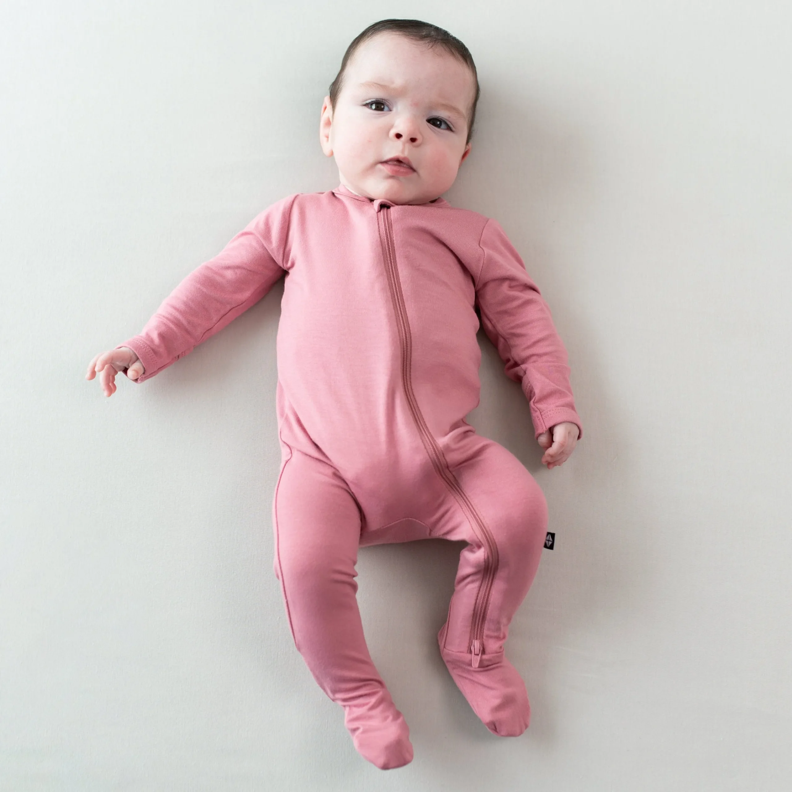 Kyte Baby Zippered Footie in Apple Blossom Sale