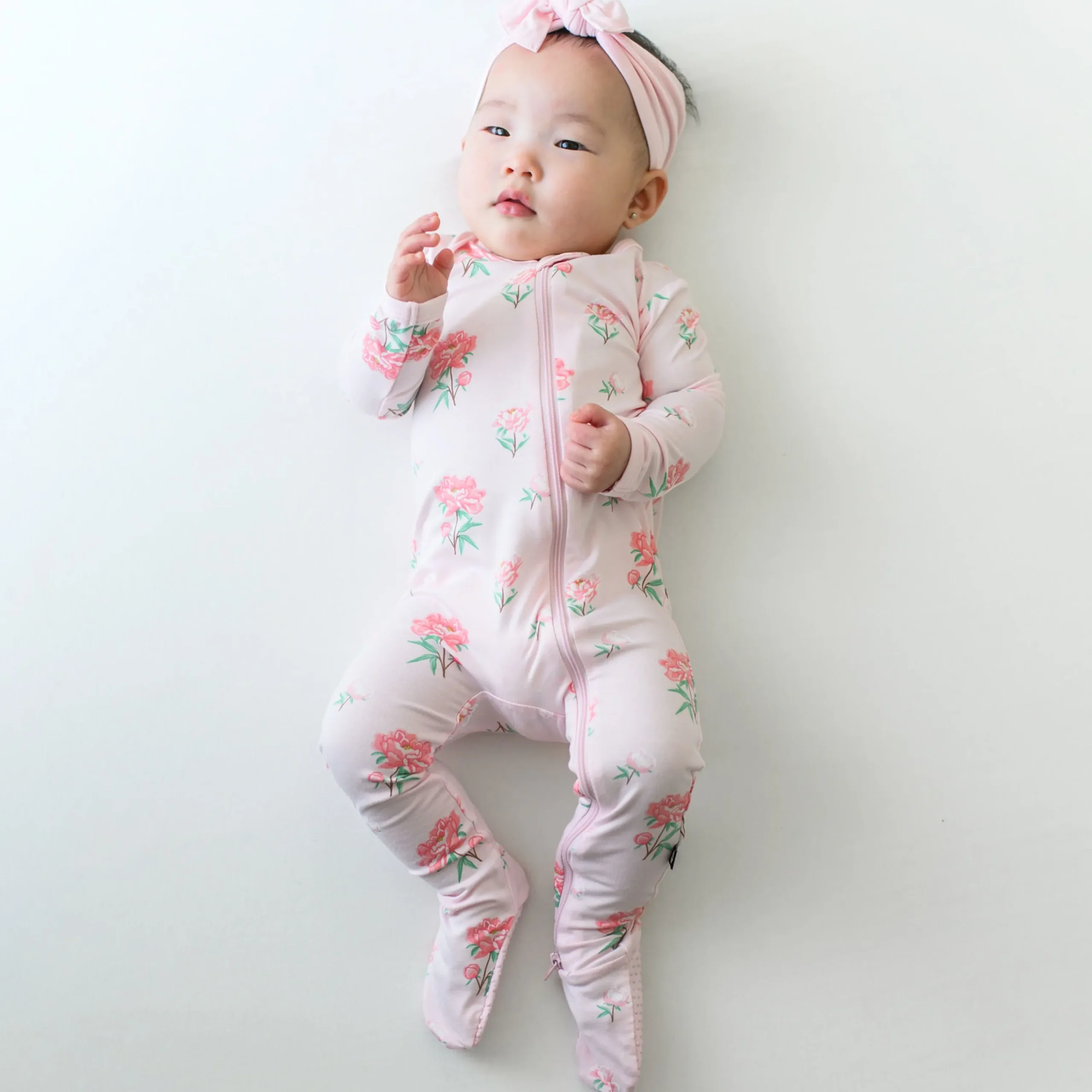 Kyte Baby Zippered Footie in Sakura Peony Hot