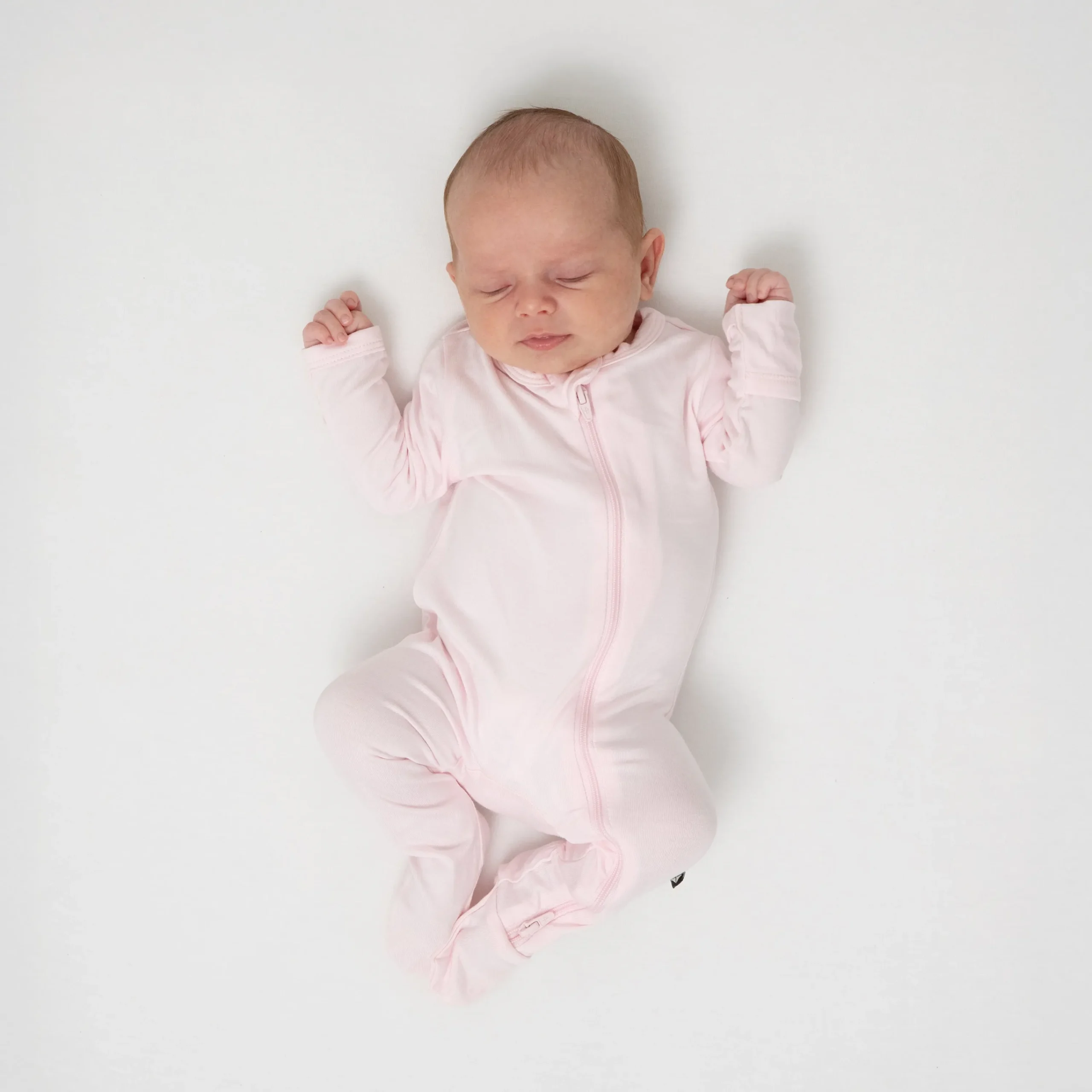 Kyte Baby Zippered Footie in Sakura