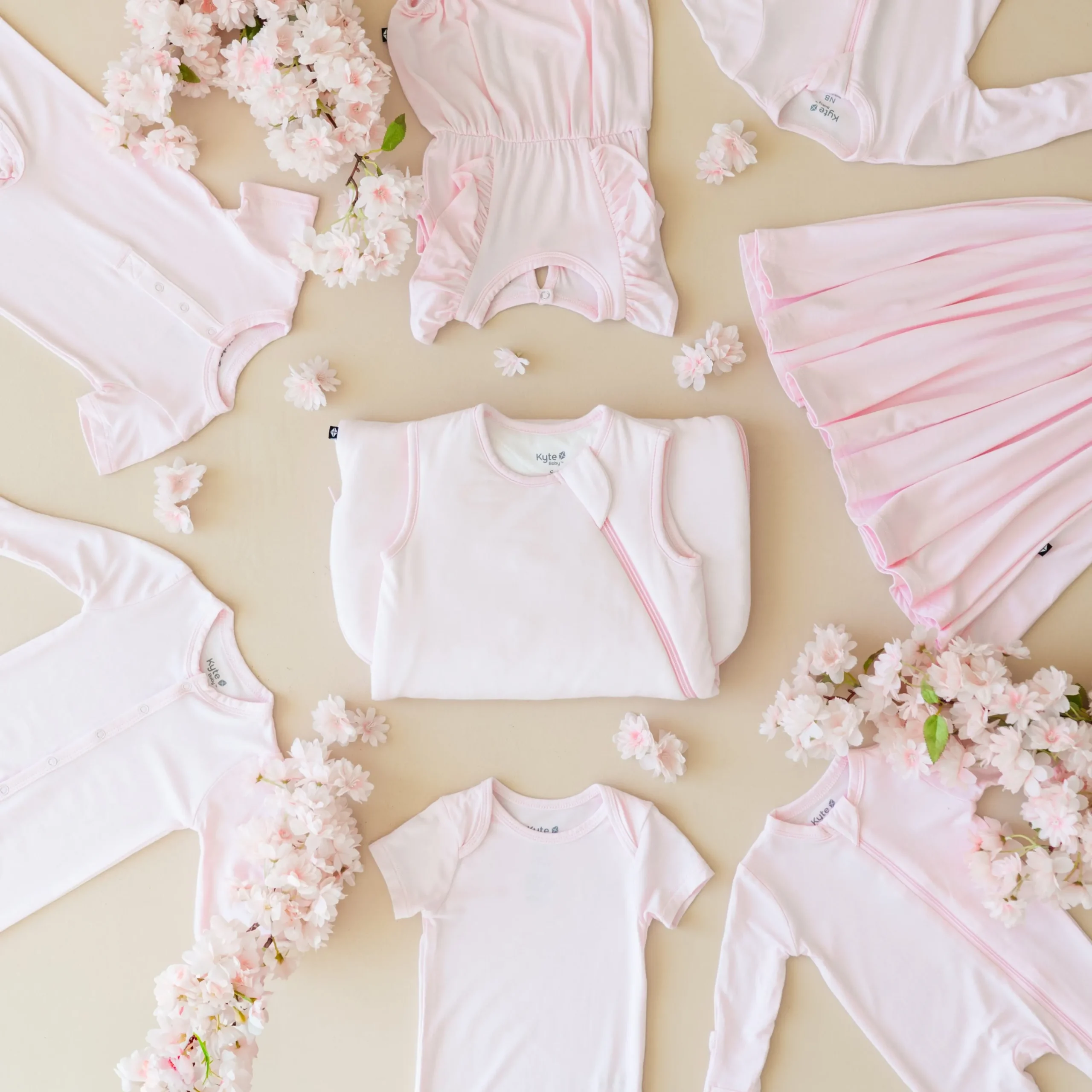 Kyte Baby Zippered Footie in Sakura