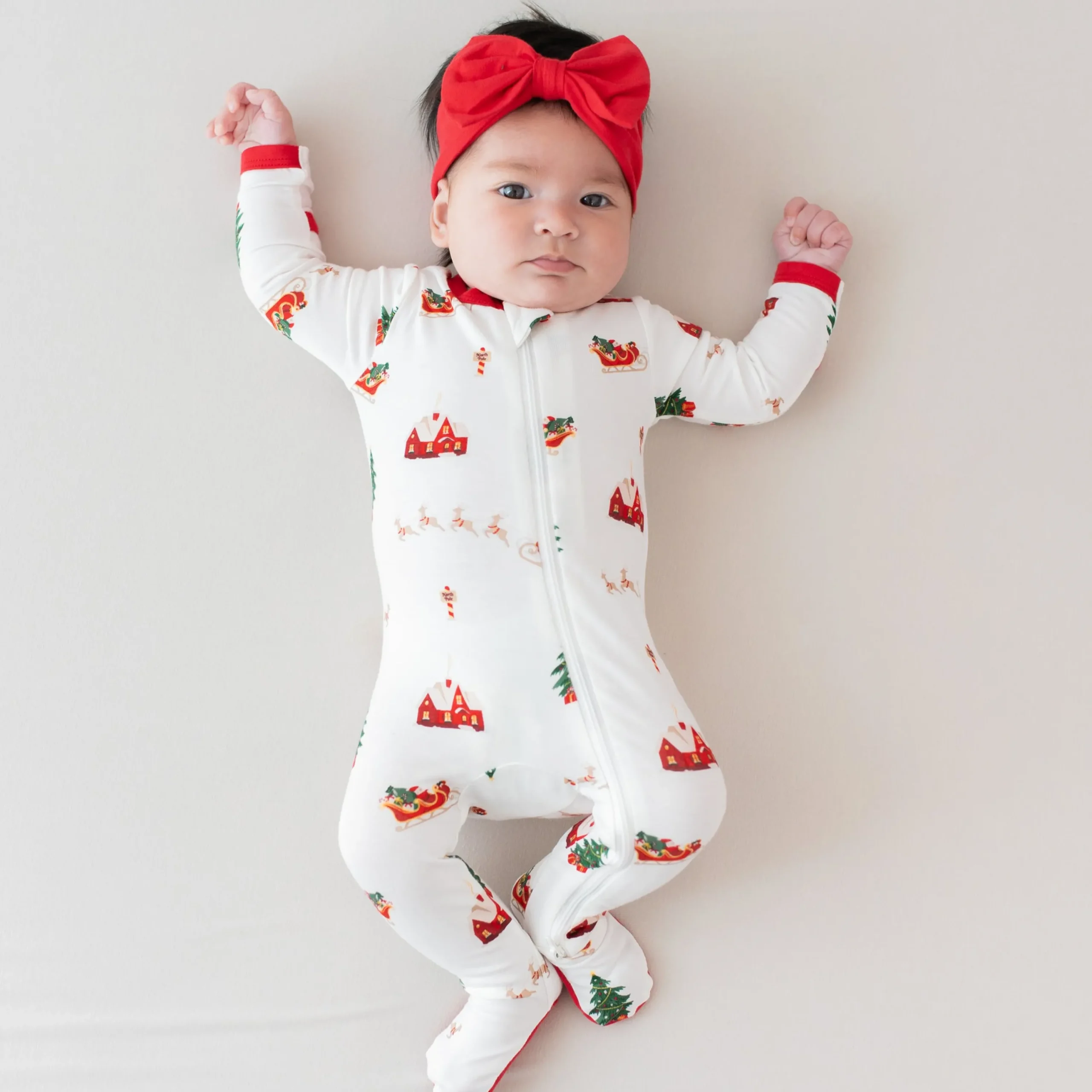 Kyte Baby Zippered Footie in Santa Sleigh Clearance