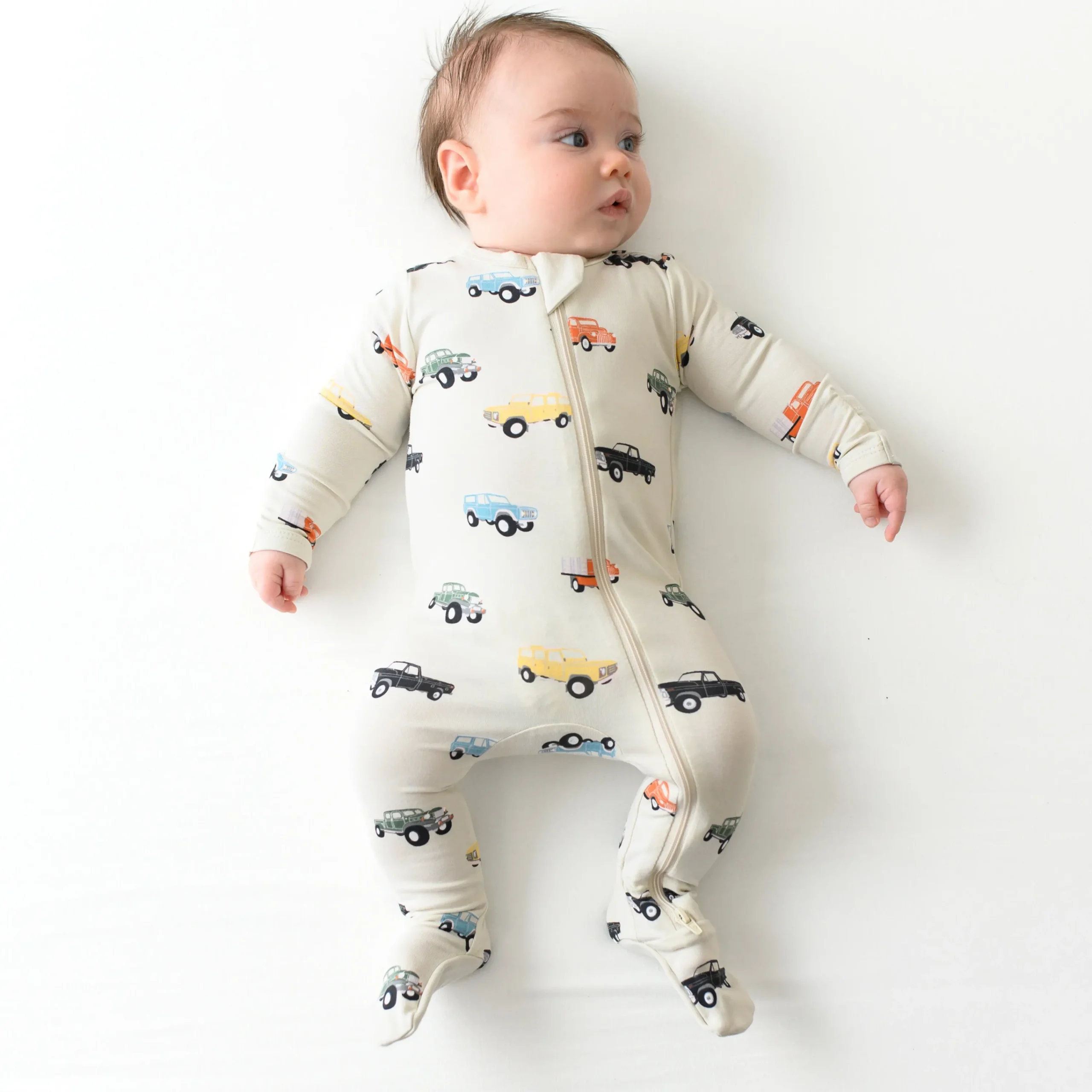 Kyte Baby Zippered Footie in Vintage Truck Hot