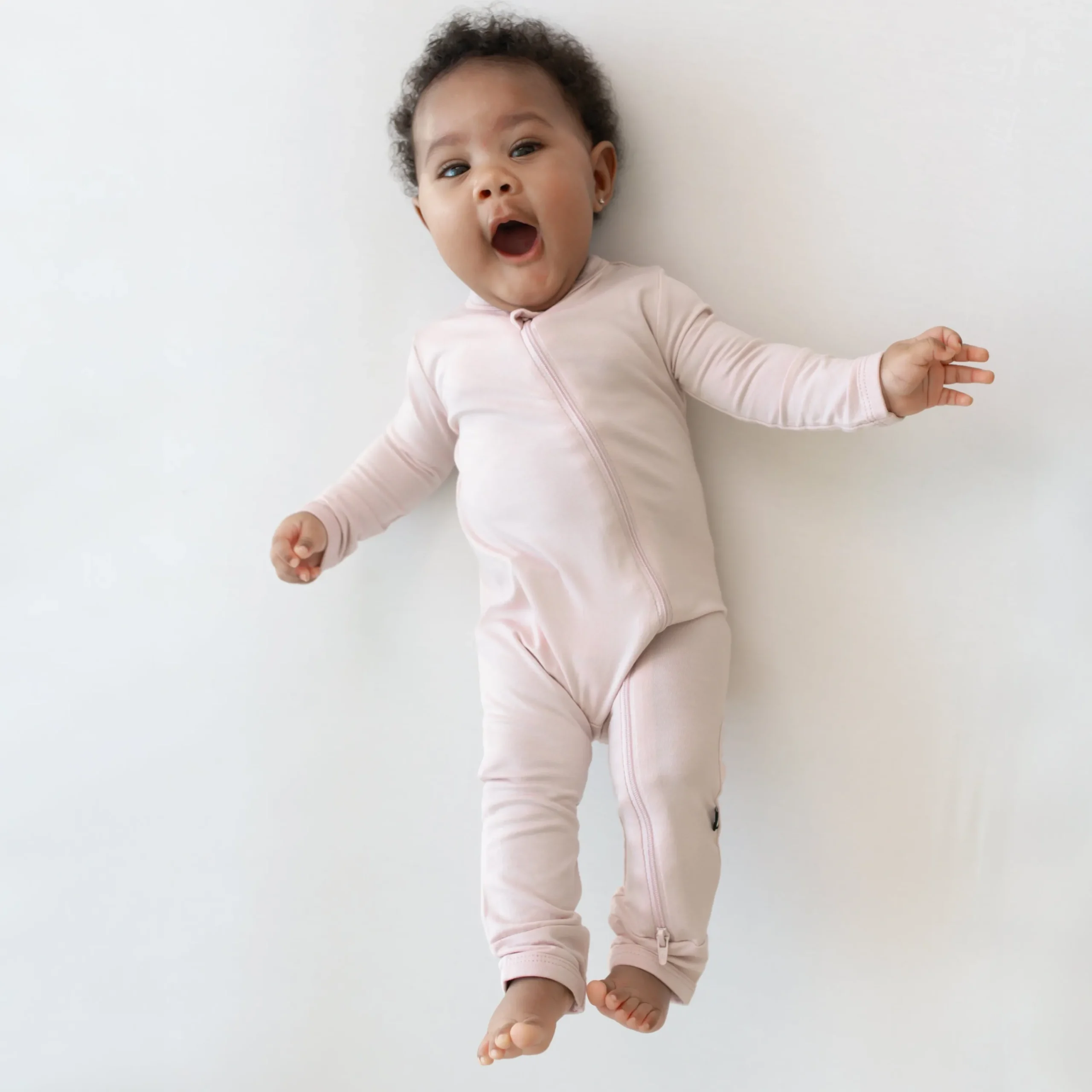 Kyte Baby Zippered Romper in Blush Discount