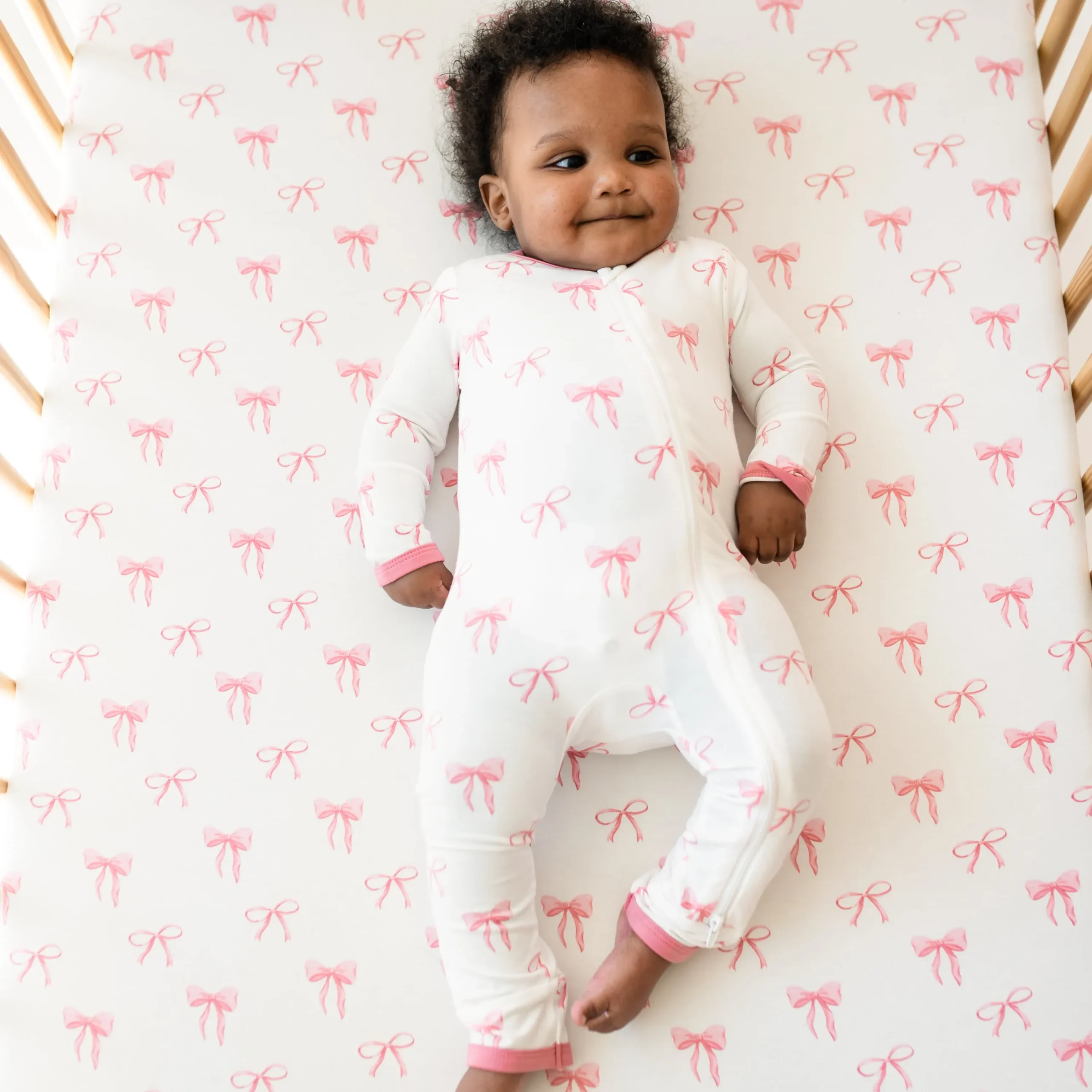 Kyte Baby Zippered Romper in Bow New