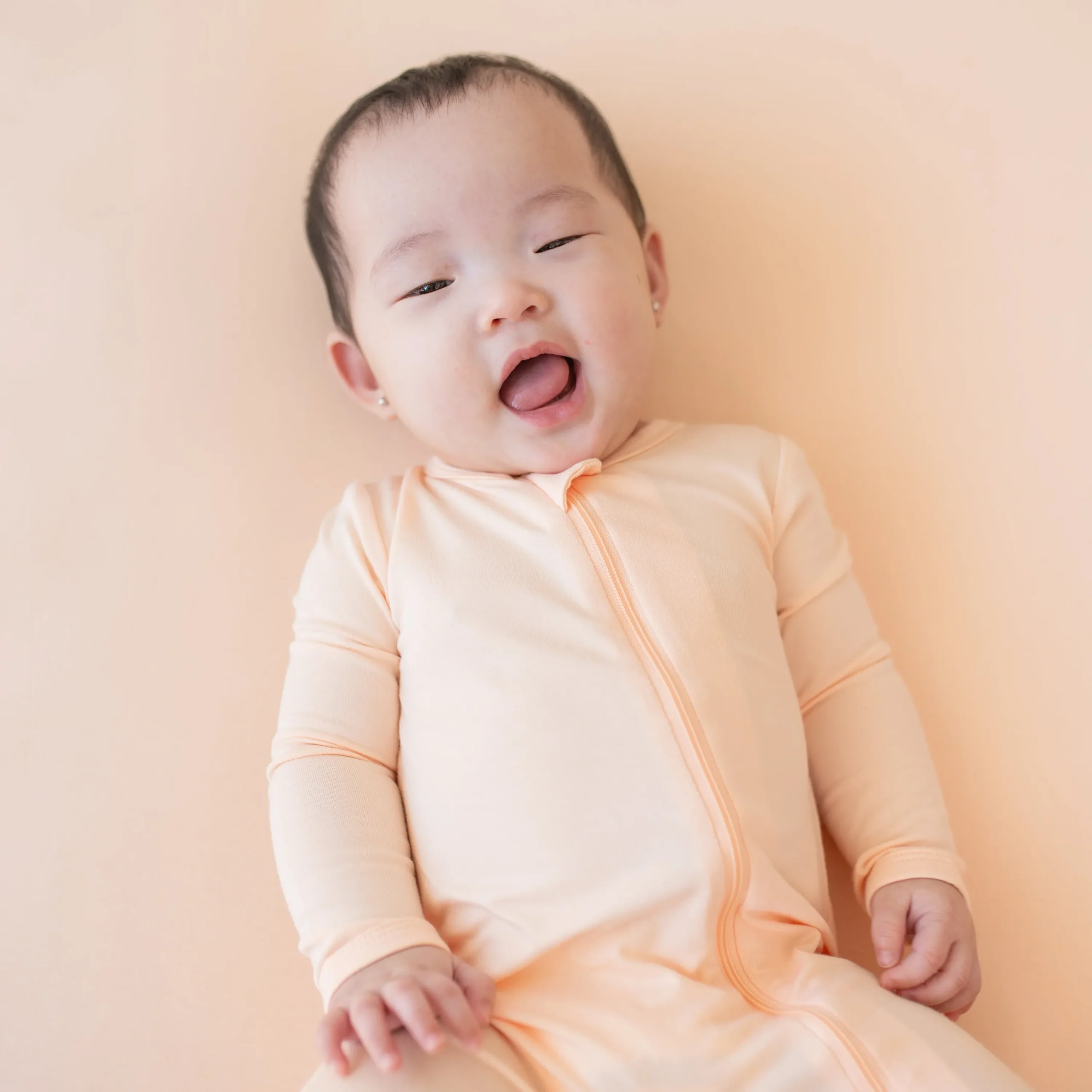 Kyte Baby Zippered Romper in Canyon New