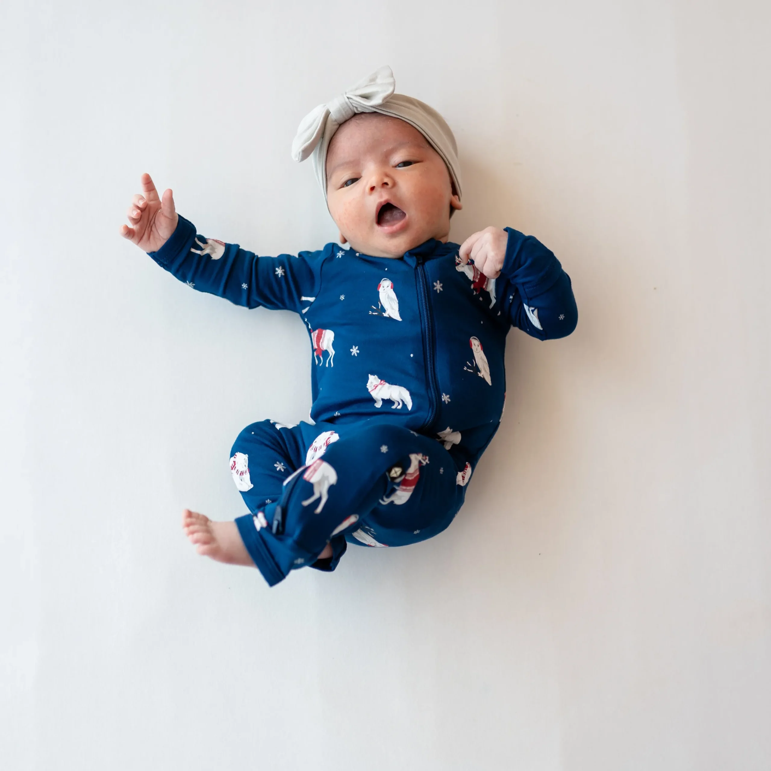 Kyte Baby Zippered Romper in Frosty Friends Hot