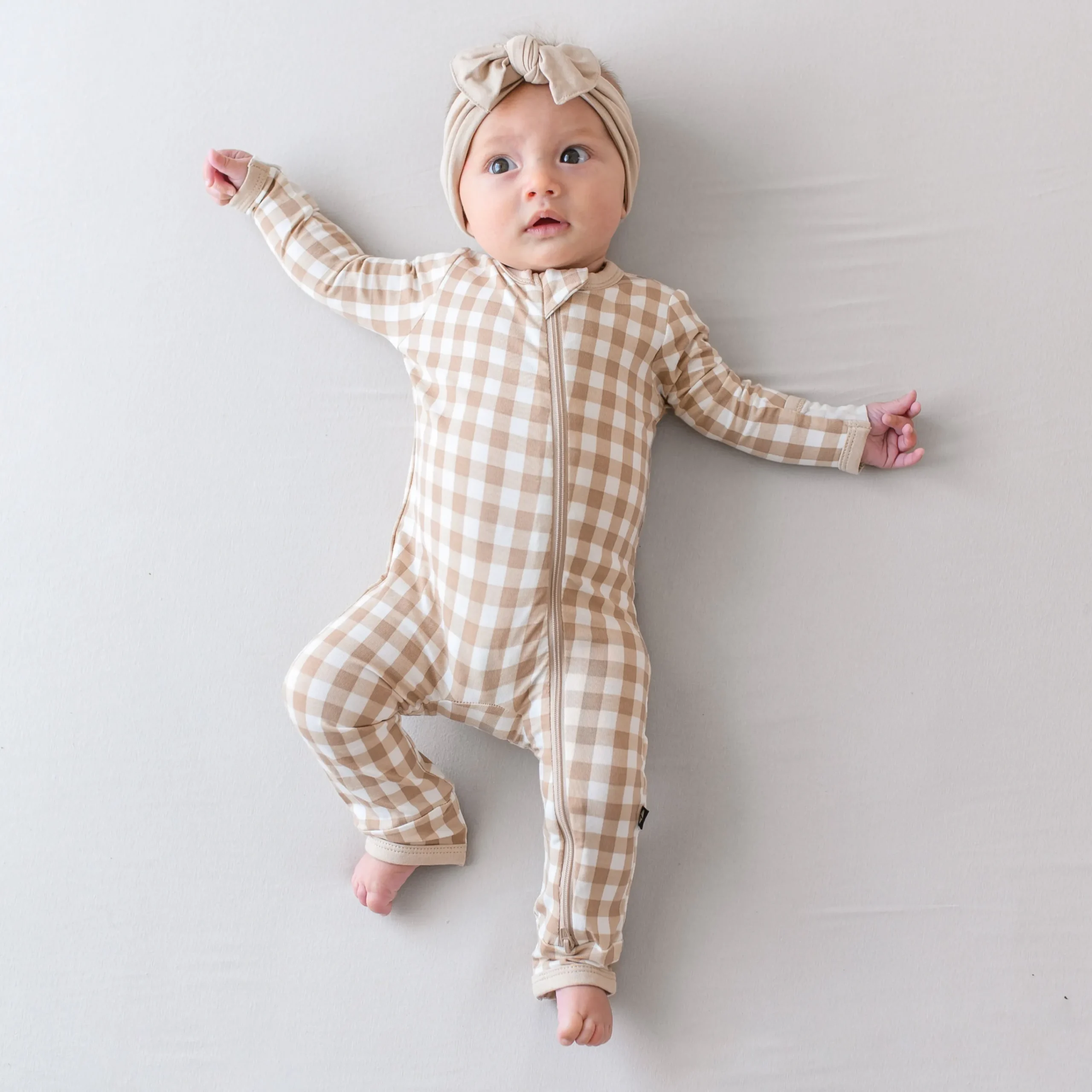 Kyte Baby Zippered Romper in Gingham Bisque Hot