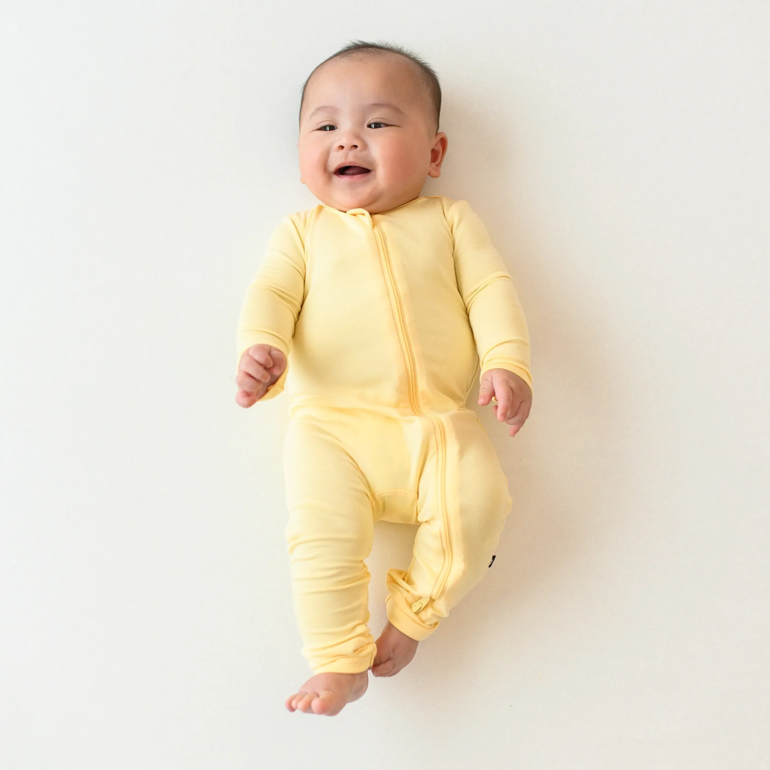 Kyte Baby Zippered Romper in Lilikoi Best