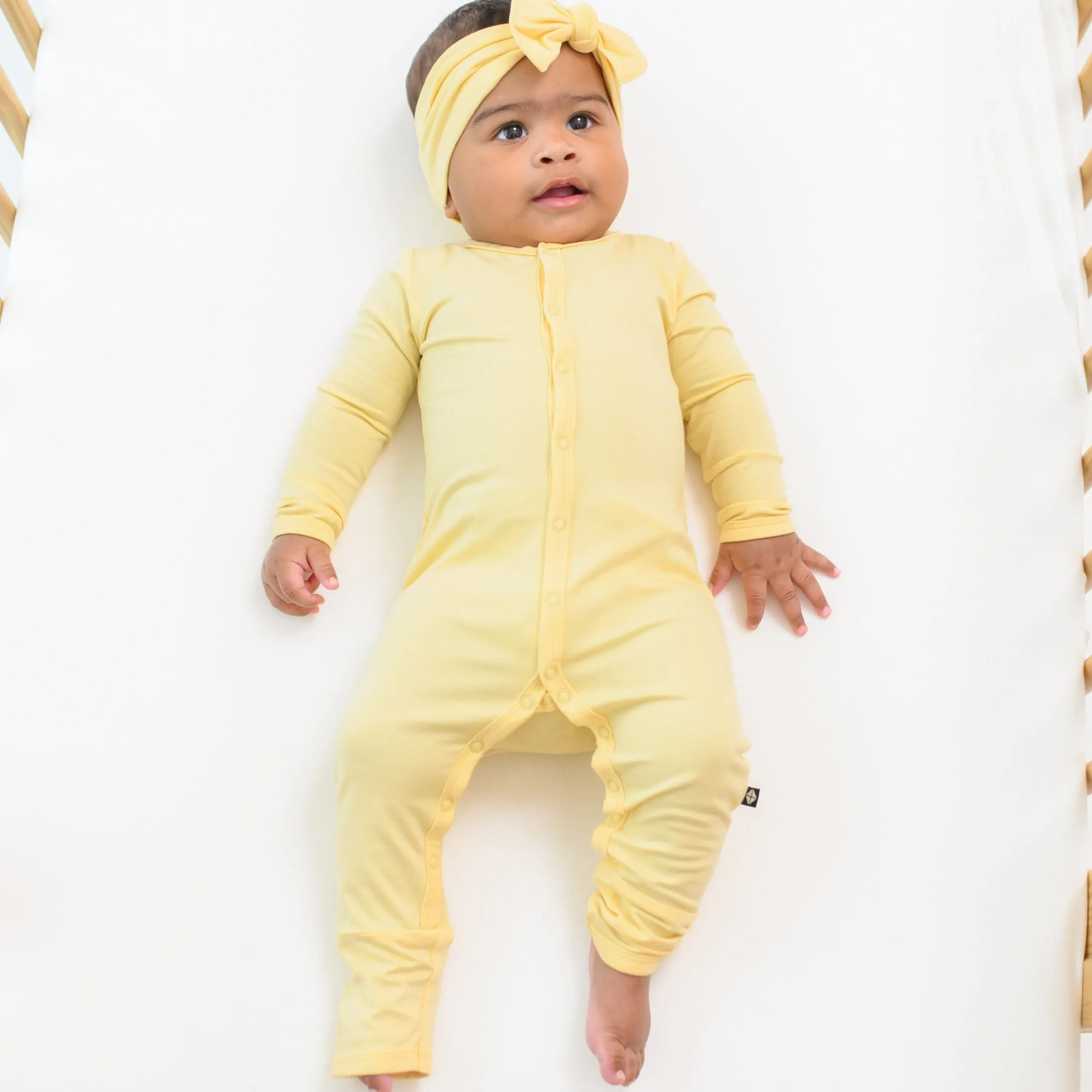 Kyte Baby Zippered Romper in Lilikoi Best