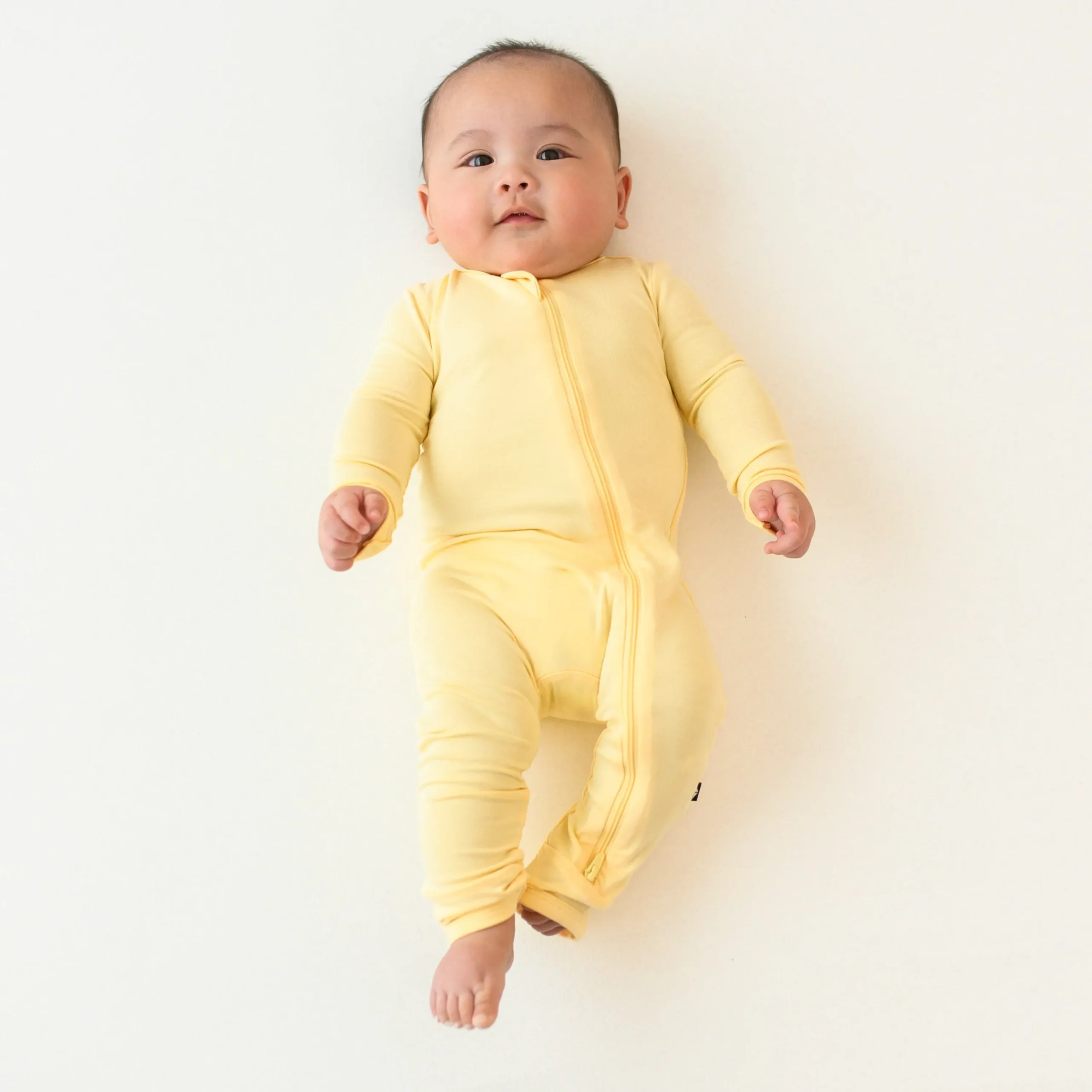 Kyte Baby Zippered Romper in Lilikoi Best
