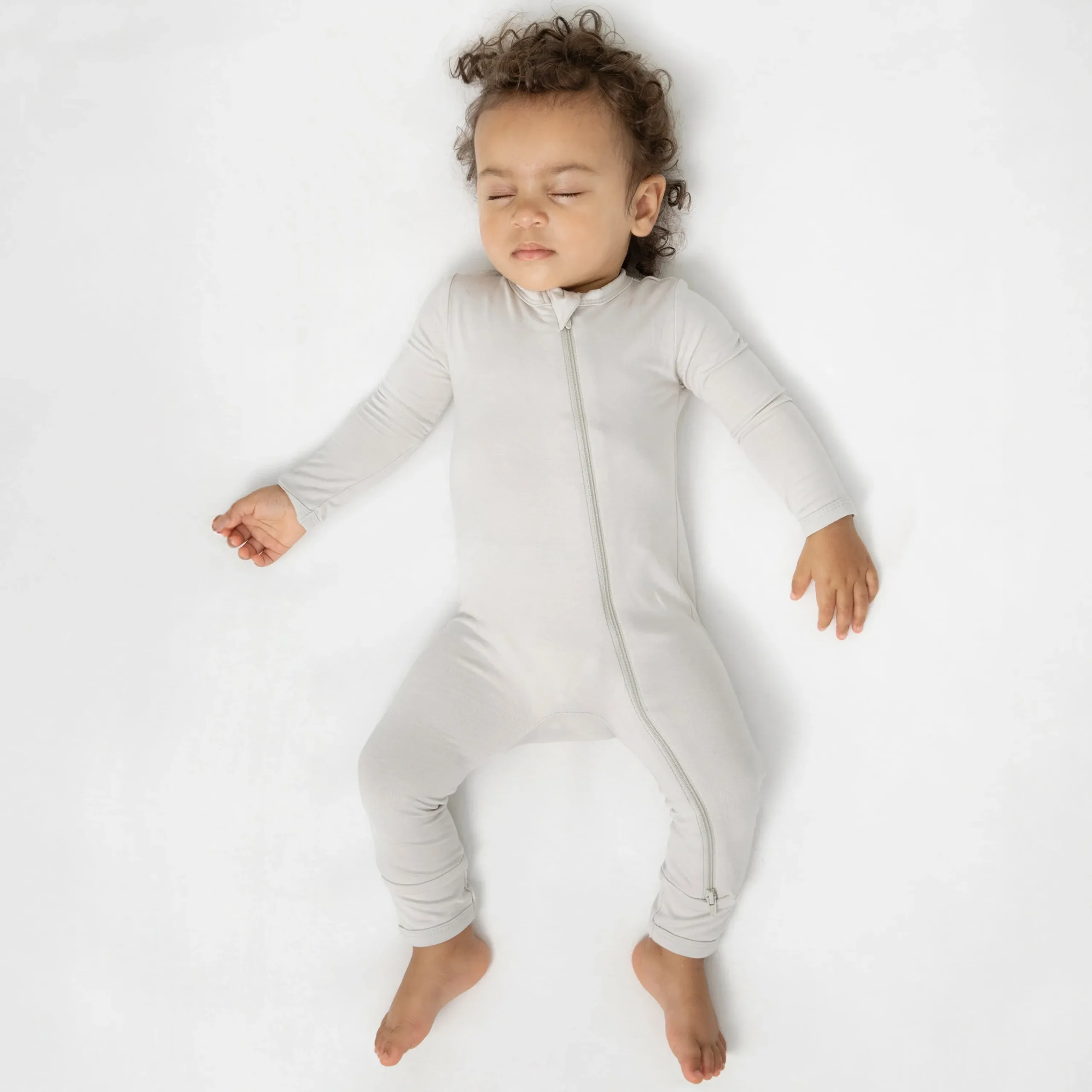 Kyte Baby Zippered Romper in Oat Outlet