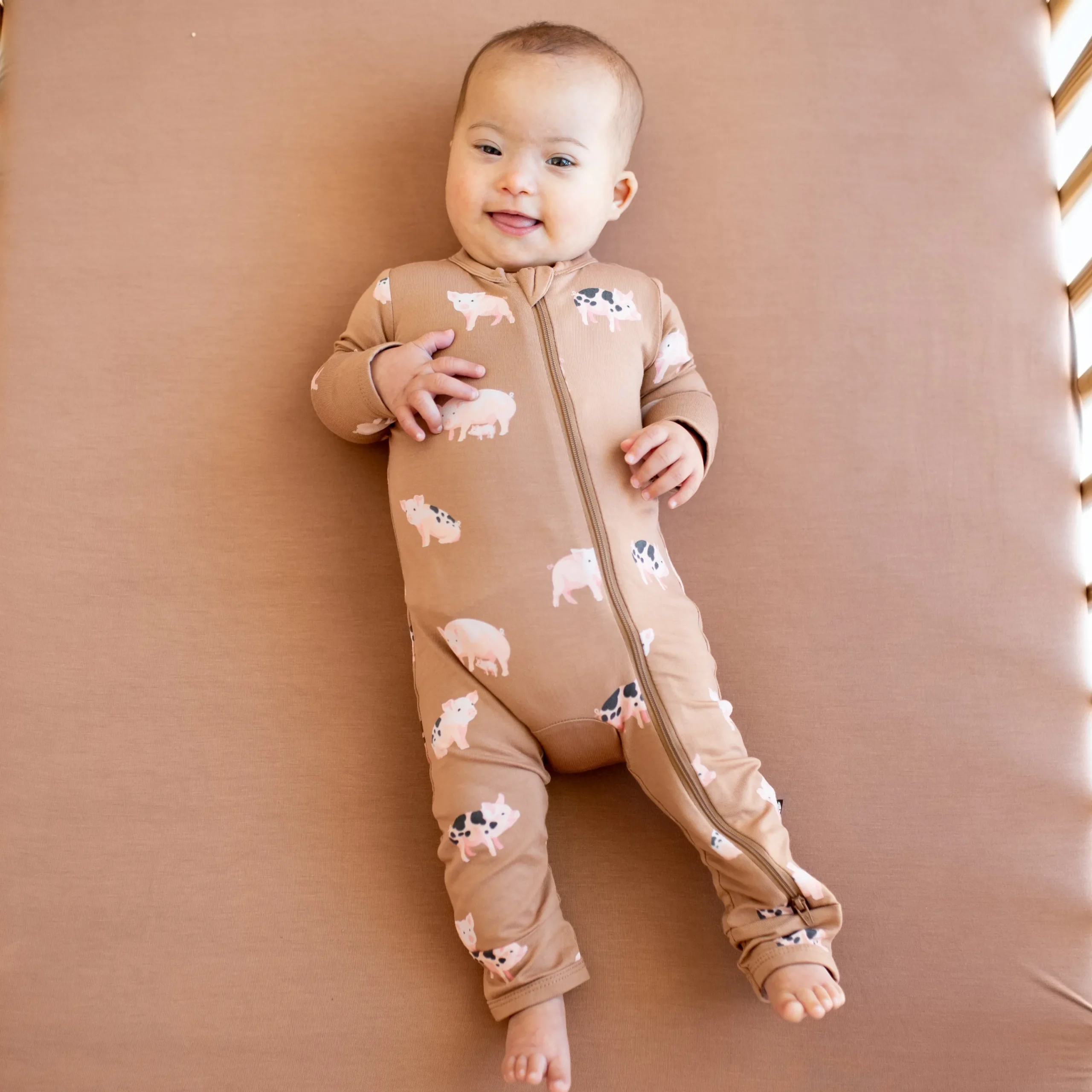 Kyte Baby Zippered Romper in Pig Outlet