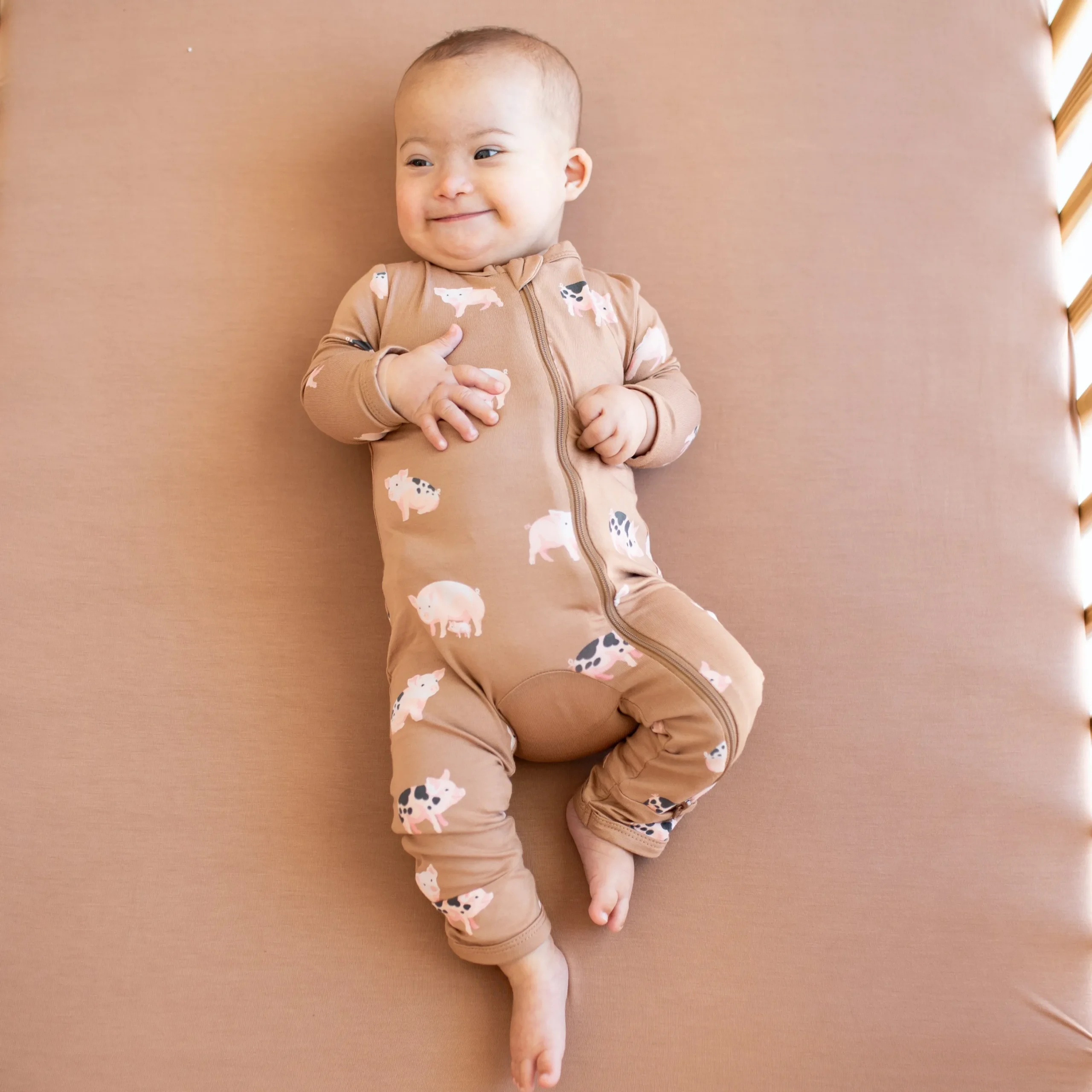 Kyte Baby Zippered Romper in Pig Outlet