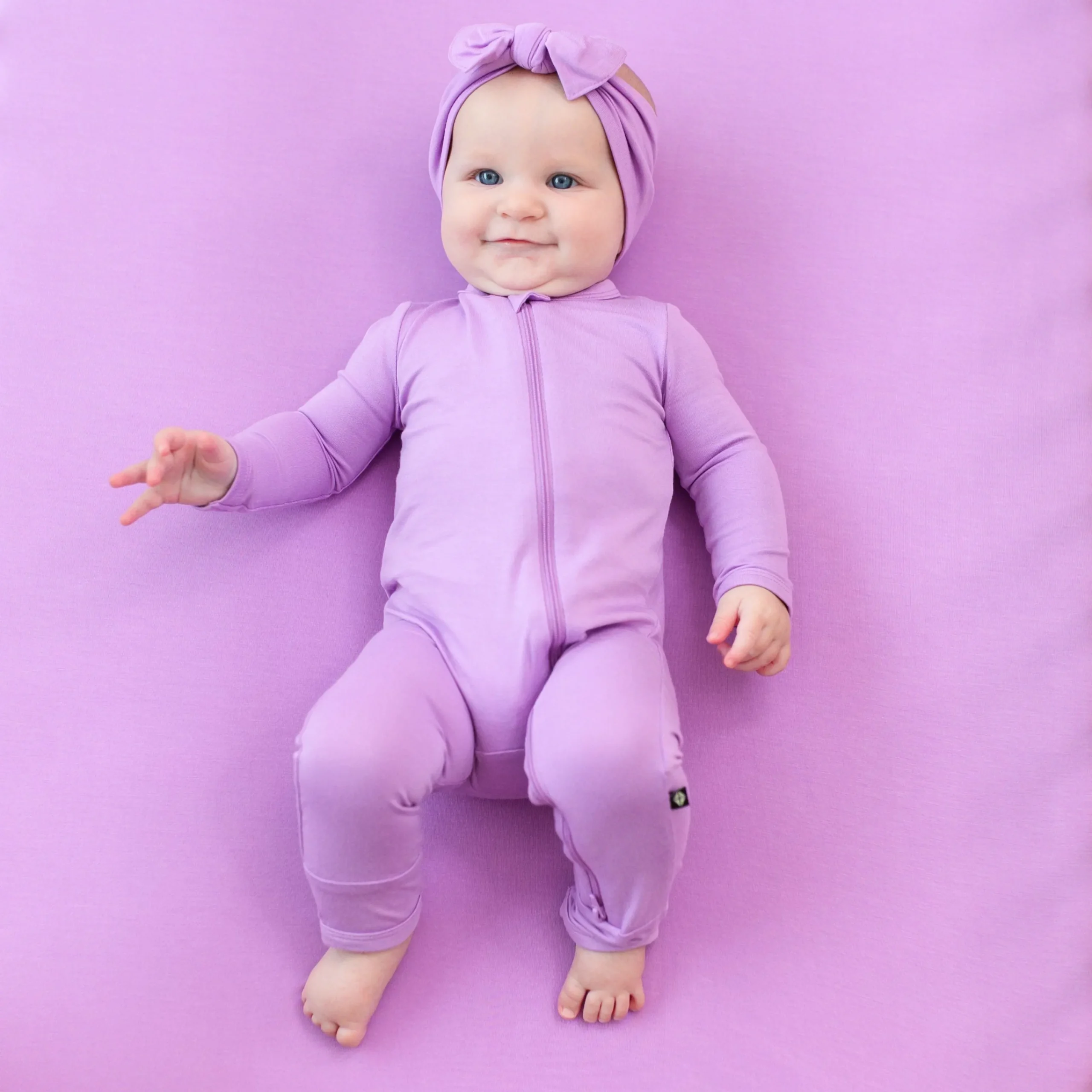 Kyte Baby Zippered Romper in Poi Hot