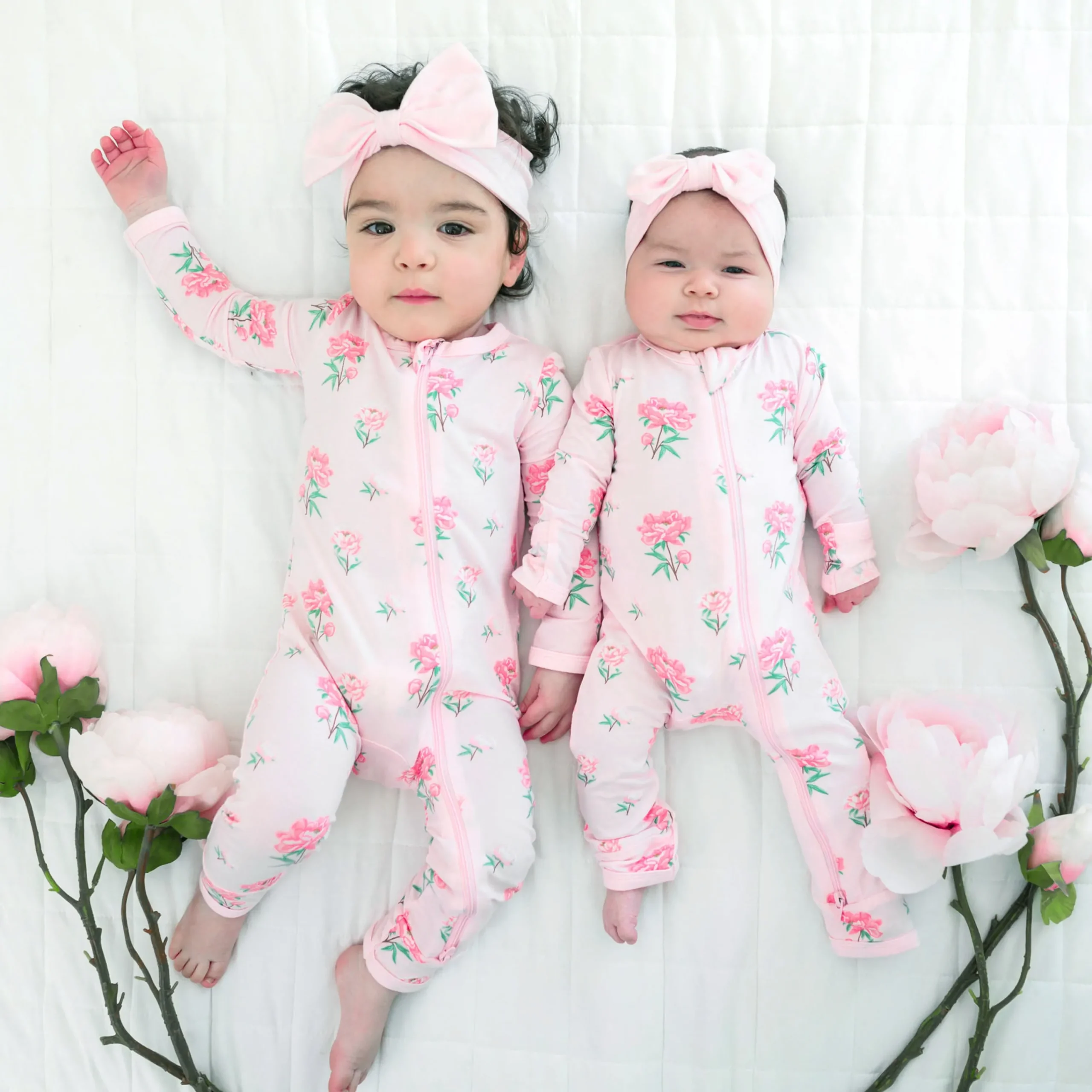 Kyte Baby Zippered Romper in Sakura Peony Hot