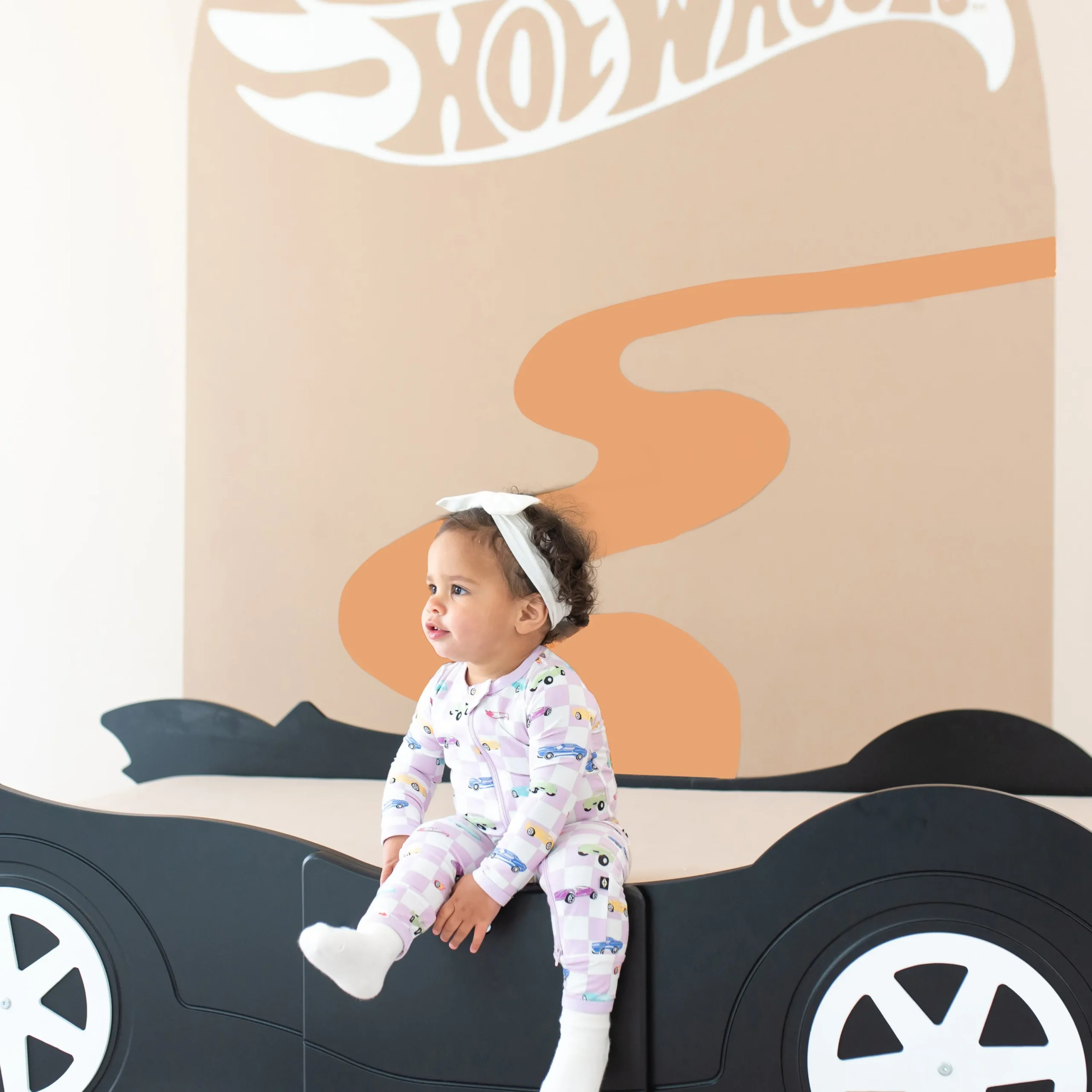 Kyte Baby Zippered Romper in Sparkles and Speed Clearance