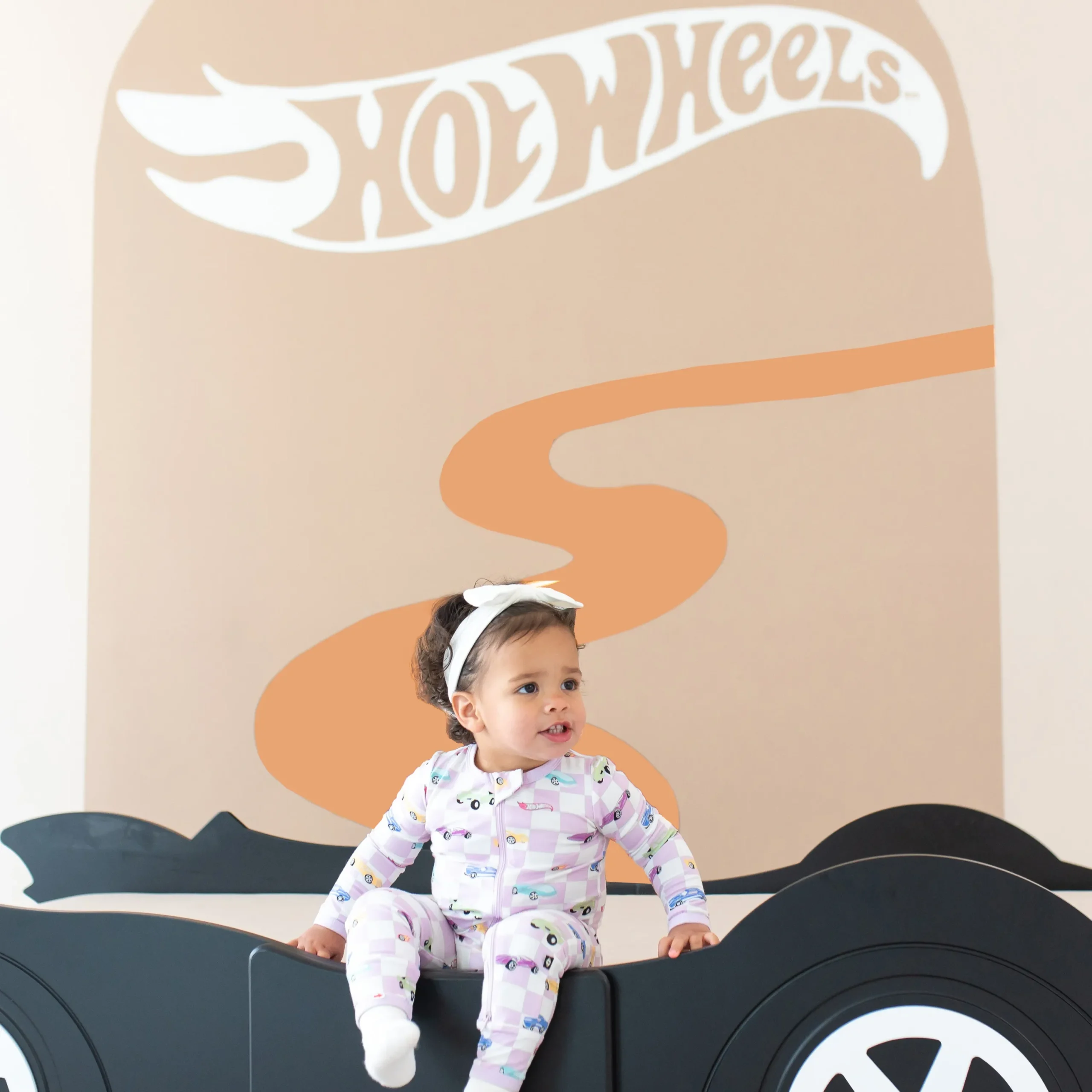 Kyte Baby Zippered Romper in Sparkles and Speed Clearance