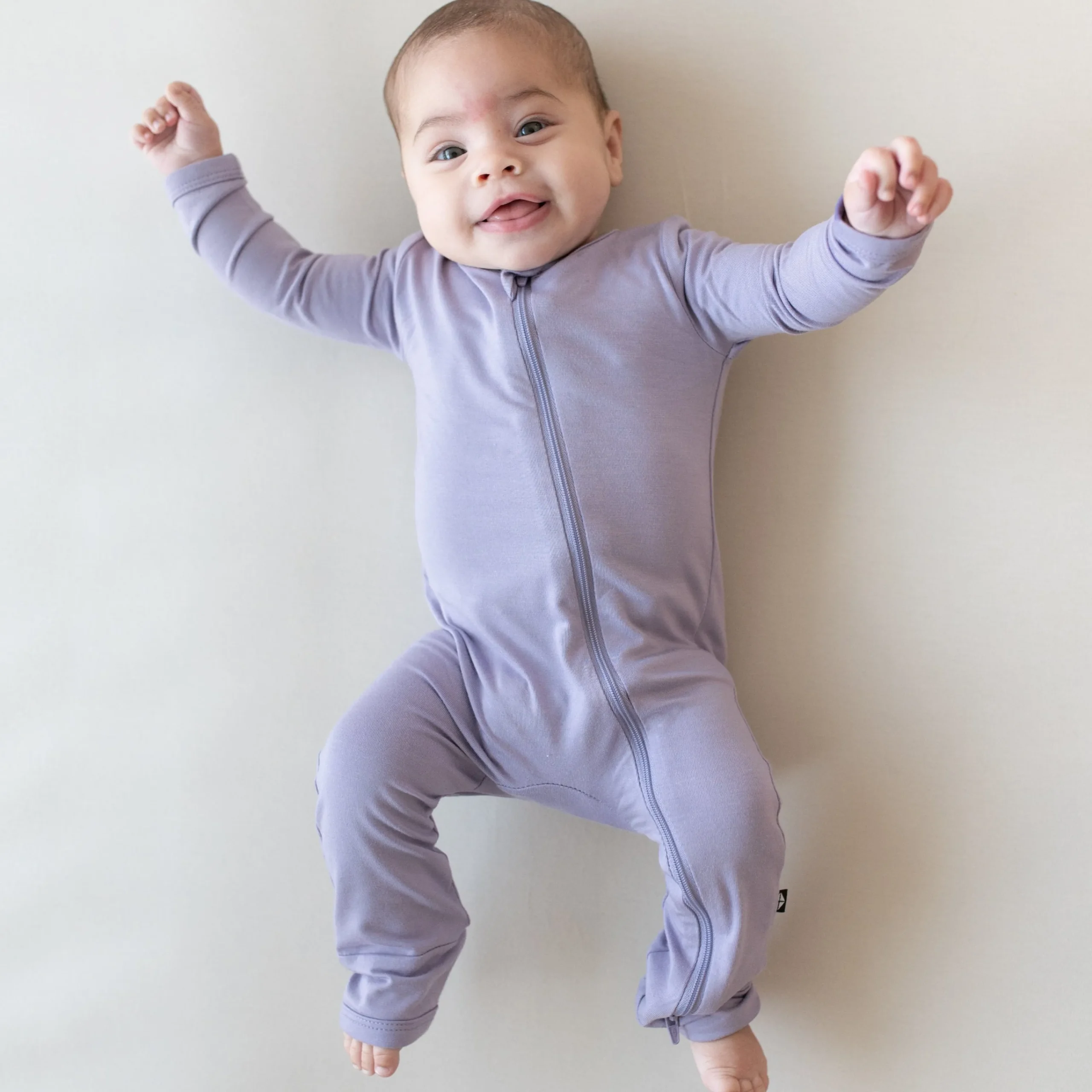 Kyte Baby Zippered Romper in Taro Sale