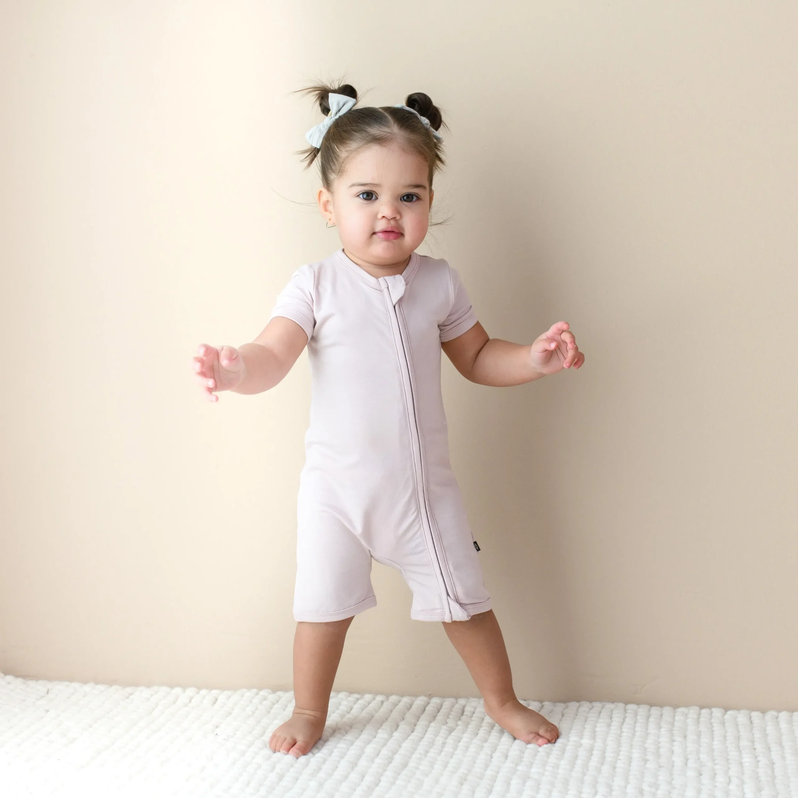 Kyte Baby Zippered Shortall Romper in Blush Discount