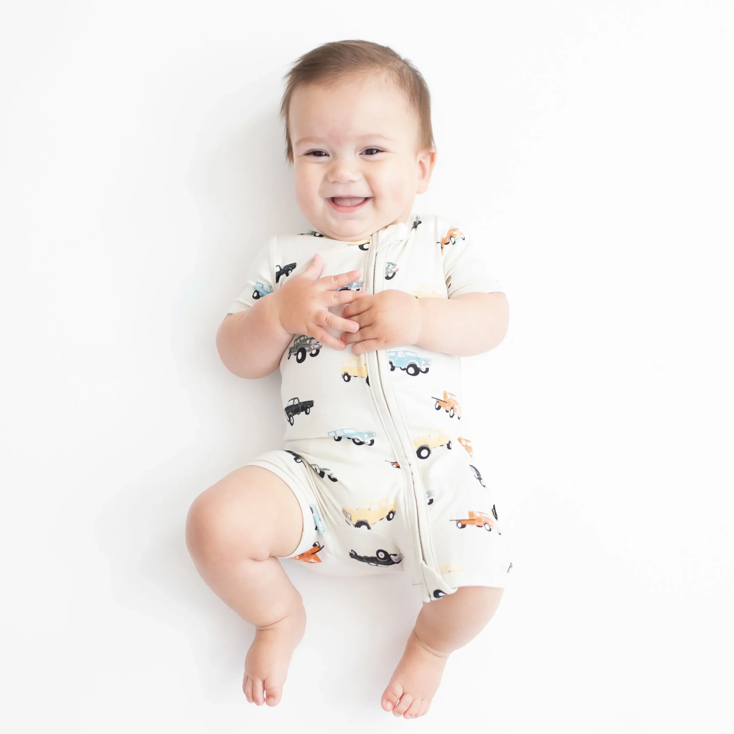 Kyte Baby Zippered Shortall Romper in Vintage Truck Clearance