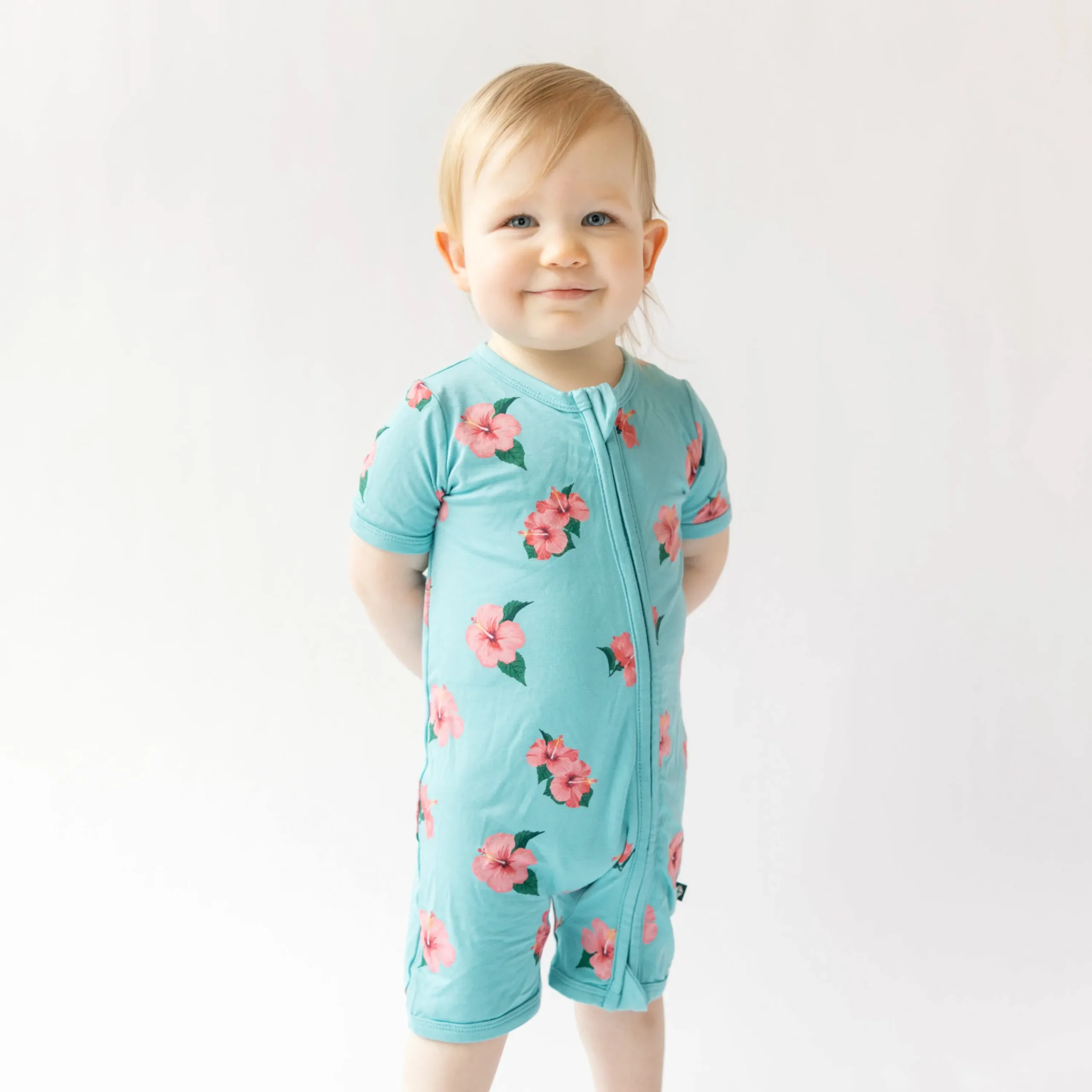 Kyte Baby Zippered Shortall Romper in Hibiscus Discount