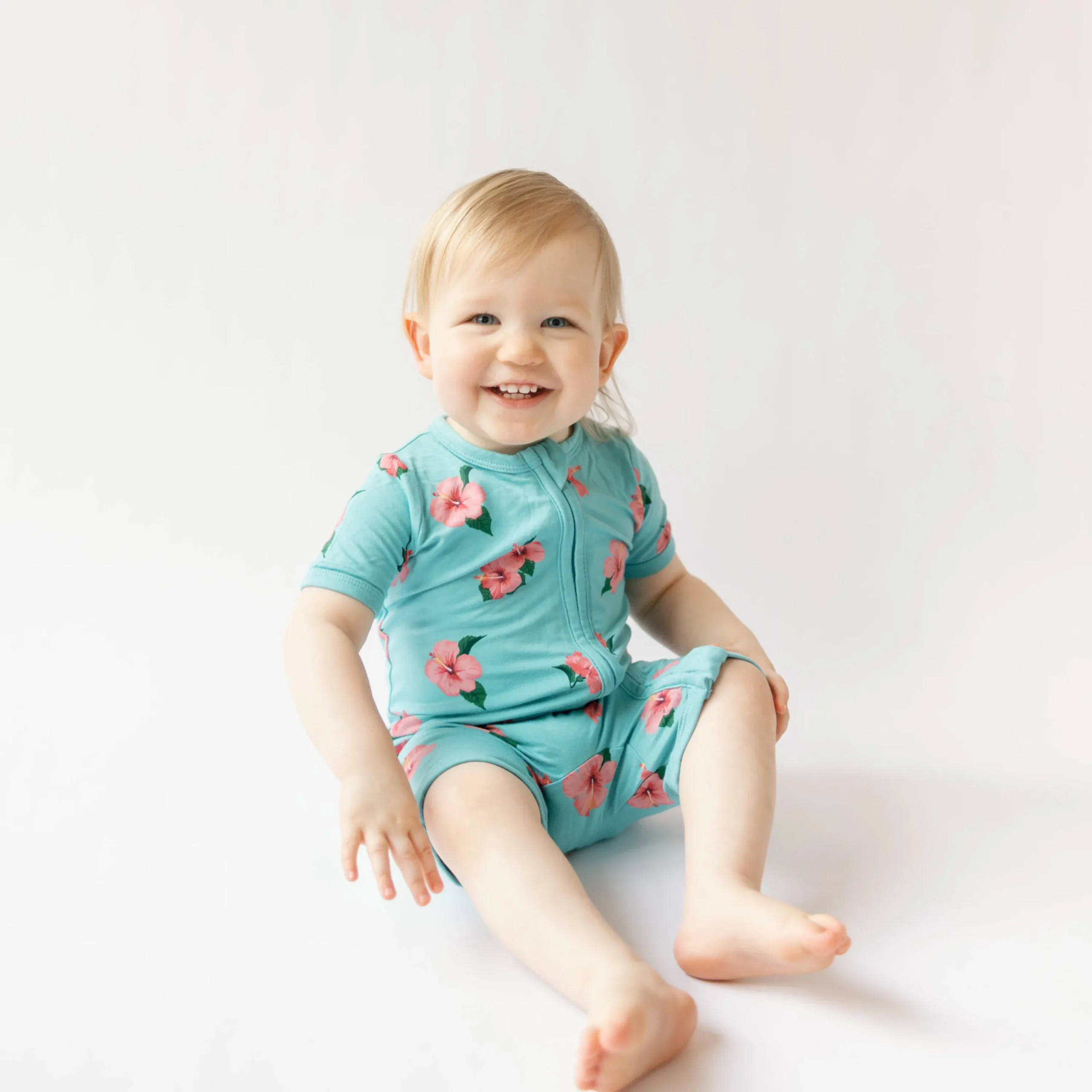 Kyte Baby Zippered Shortall Romper in Hibiscus Discount