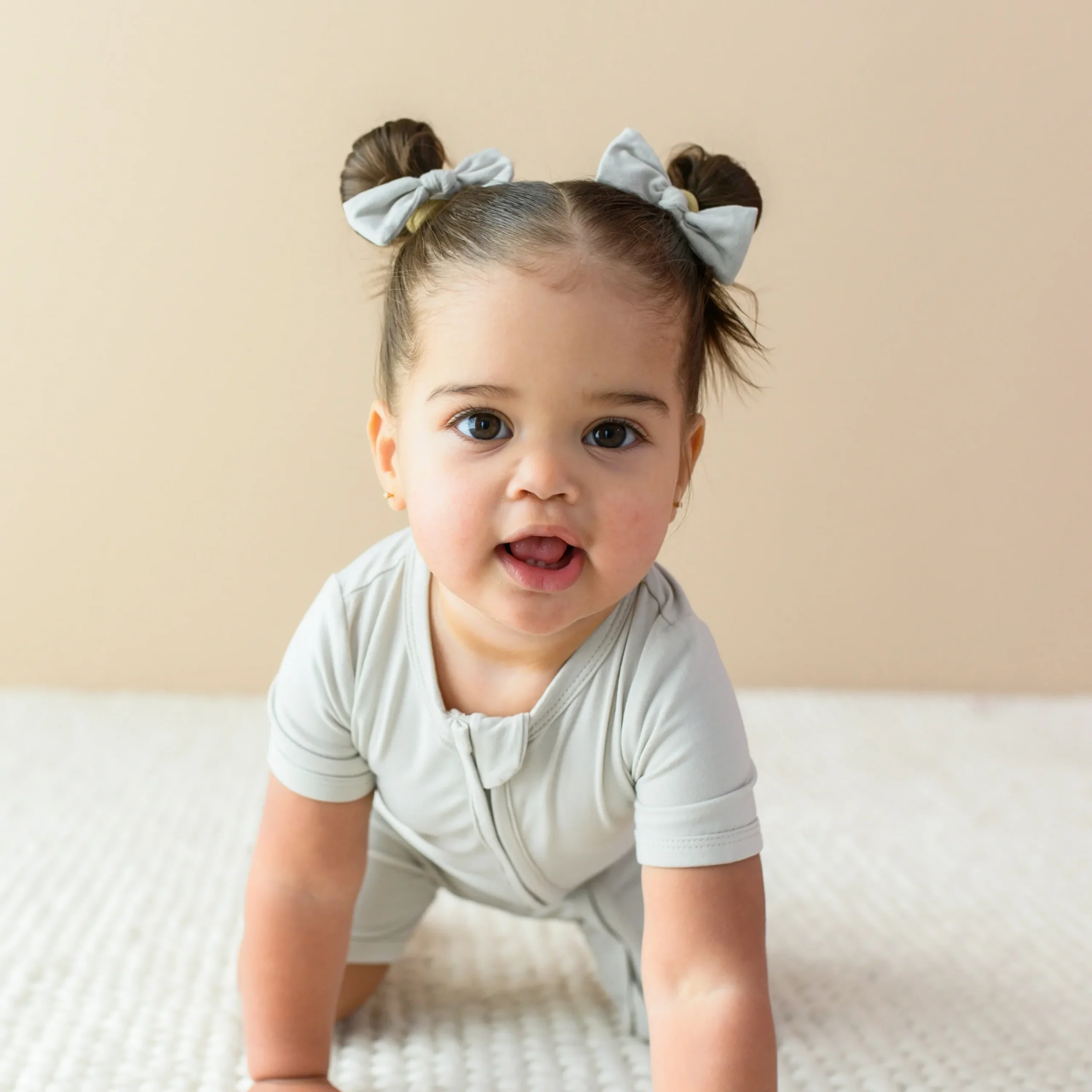 Kyte Baby Zippered Shortall Romper in Oat Clearance