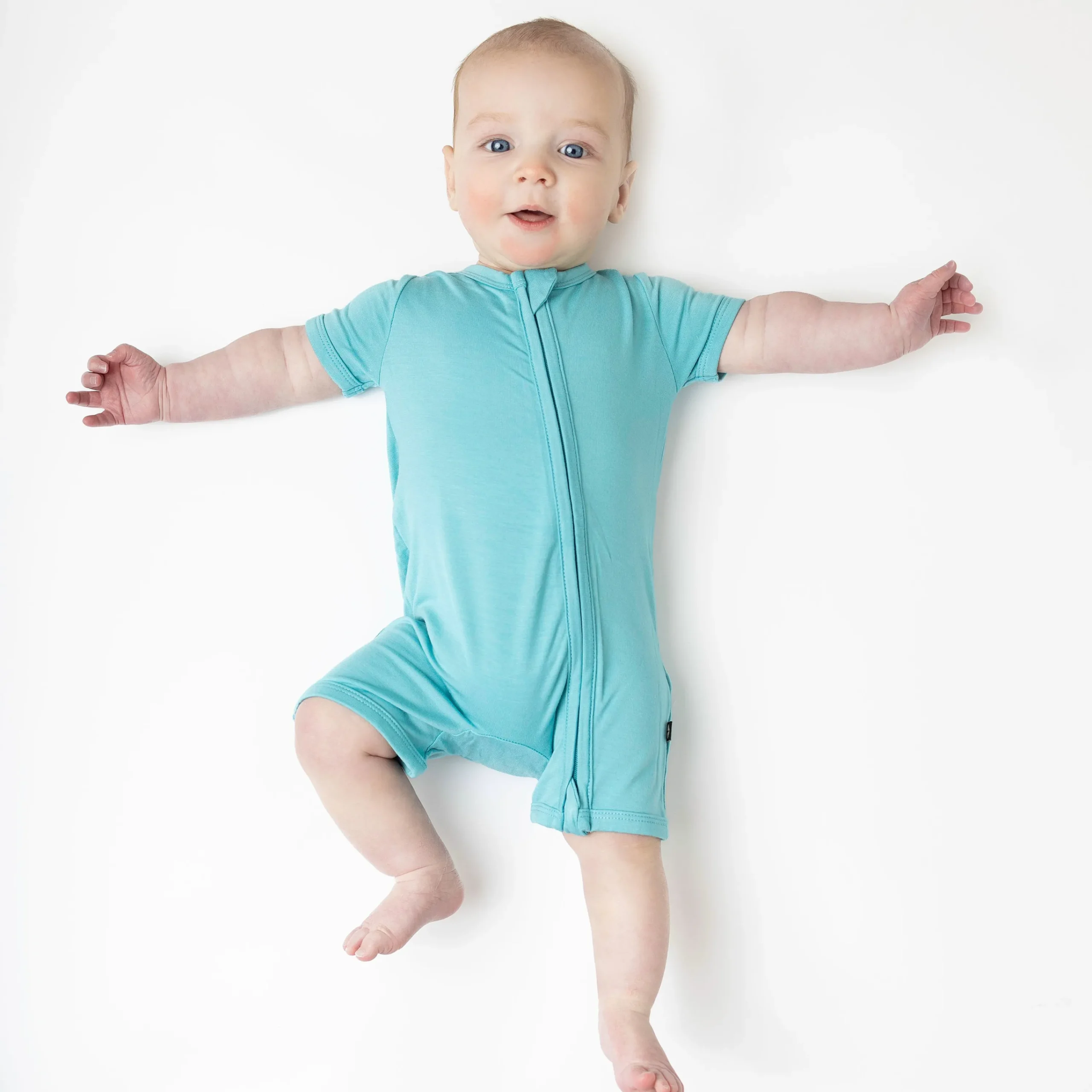 Kyte Baby Zippered Shortall Romper in Makai Outlet