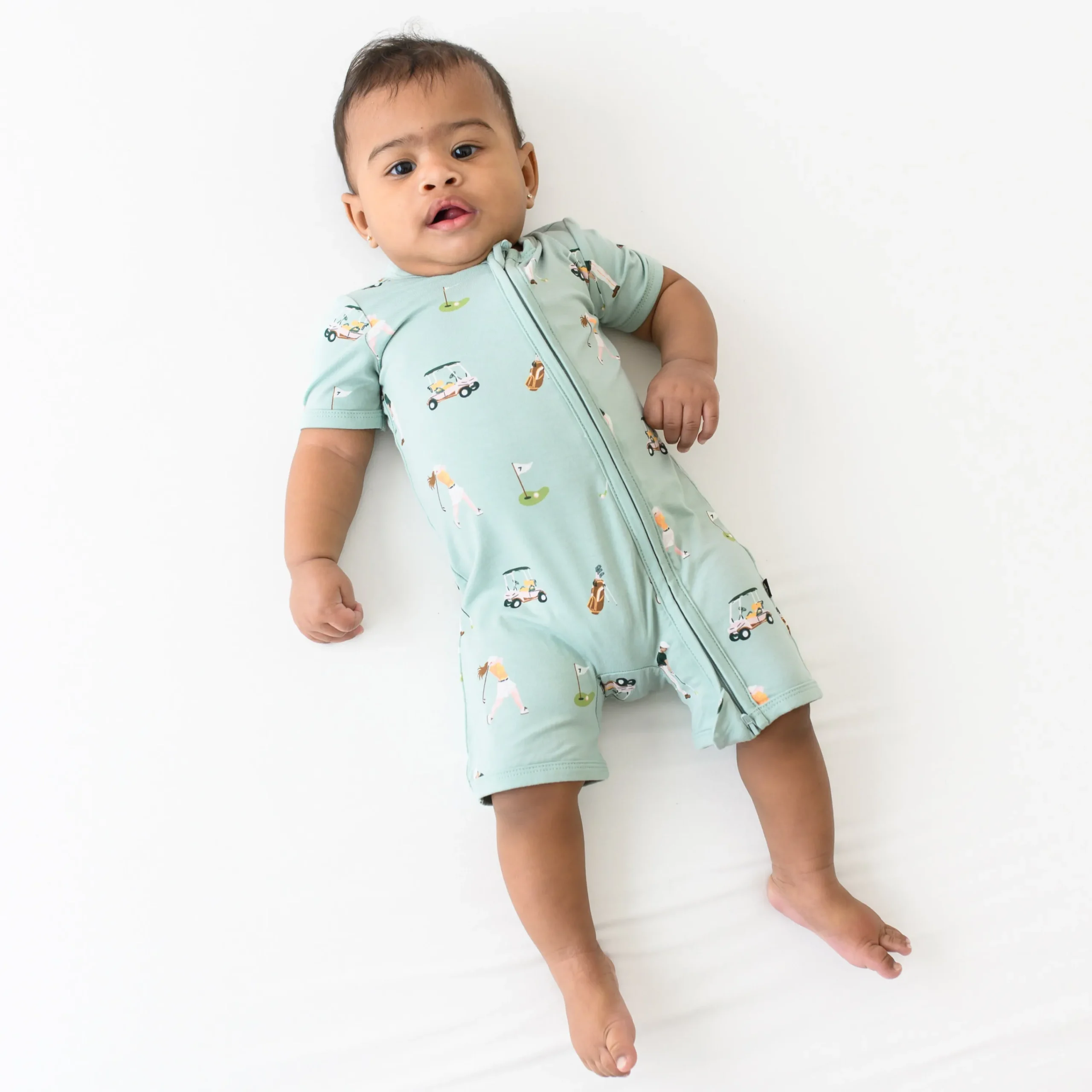 Kyte Baby Zippered Shortall Romper in Golf Online