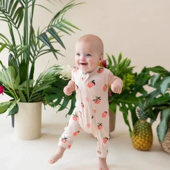 Kyte Baby Zippered Sleeveless Romper in Peach Sale
